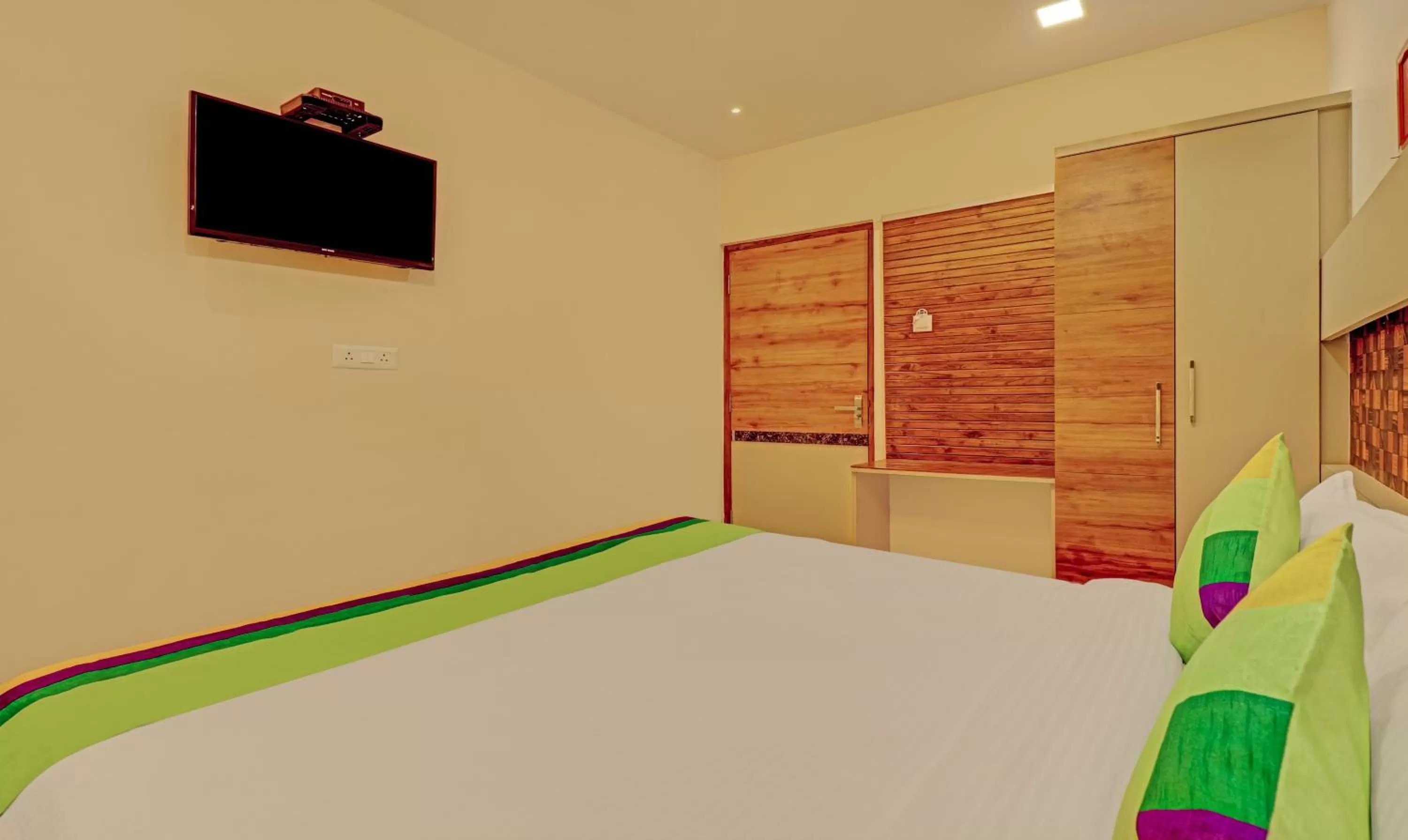 Bedroom, Bed in Treebo Rainbow Grand