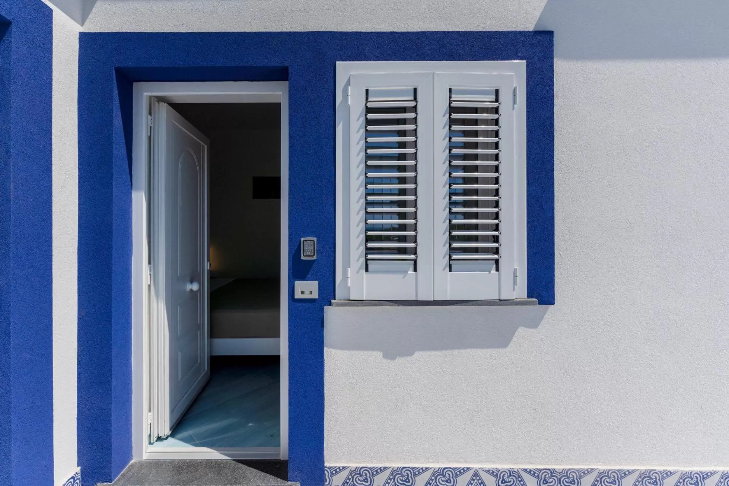 Property building in Poseidonia Rooms