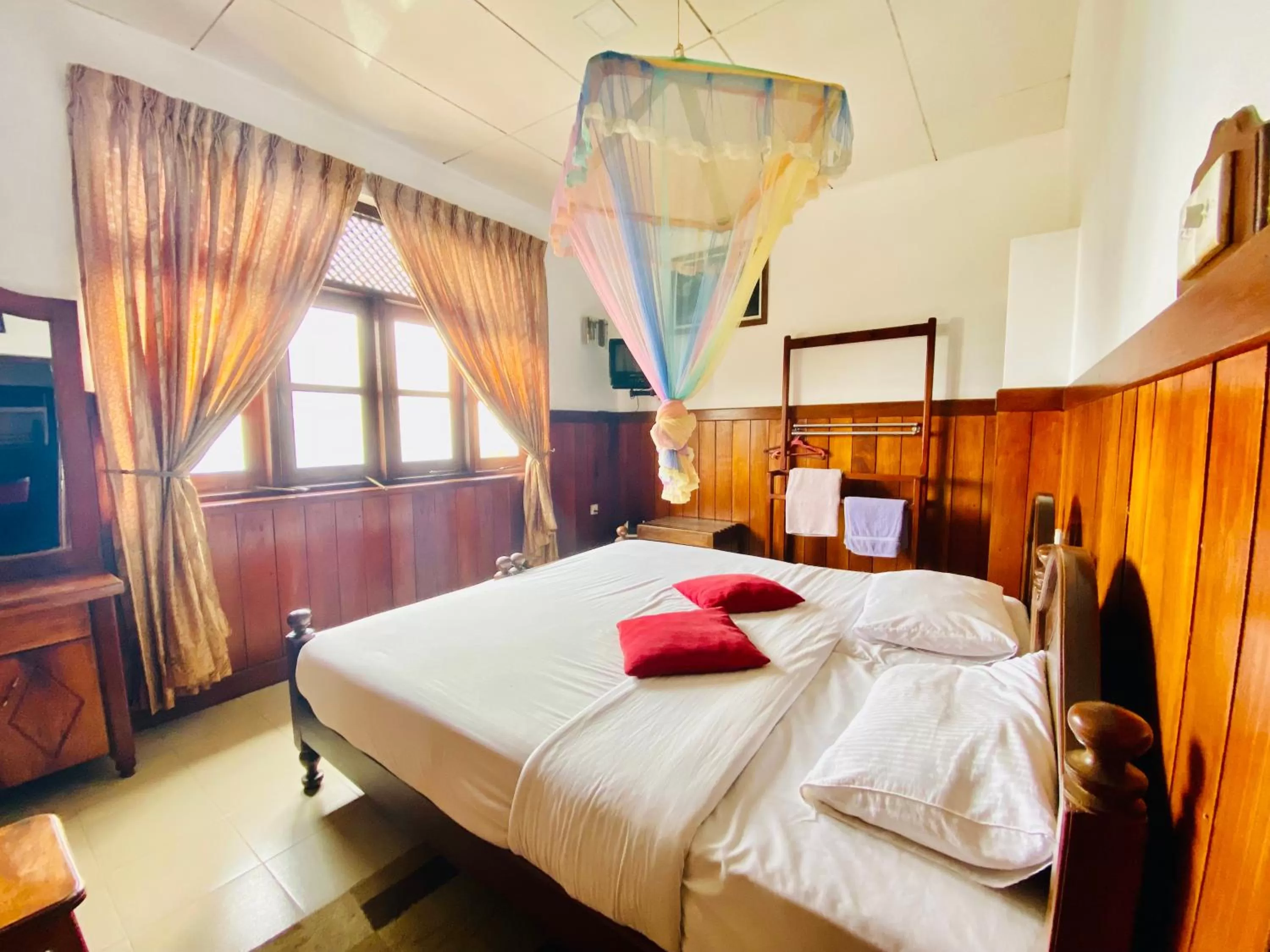 Bed in Srilak View Holiday Inn