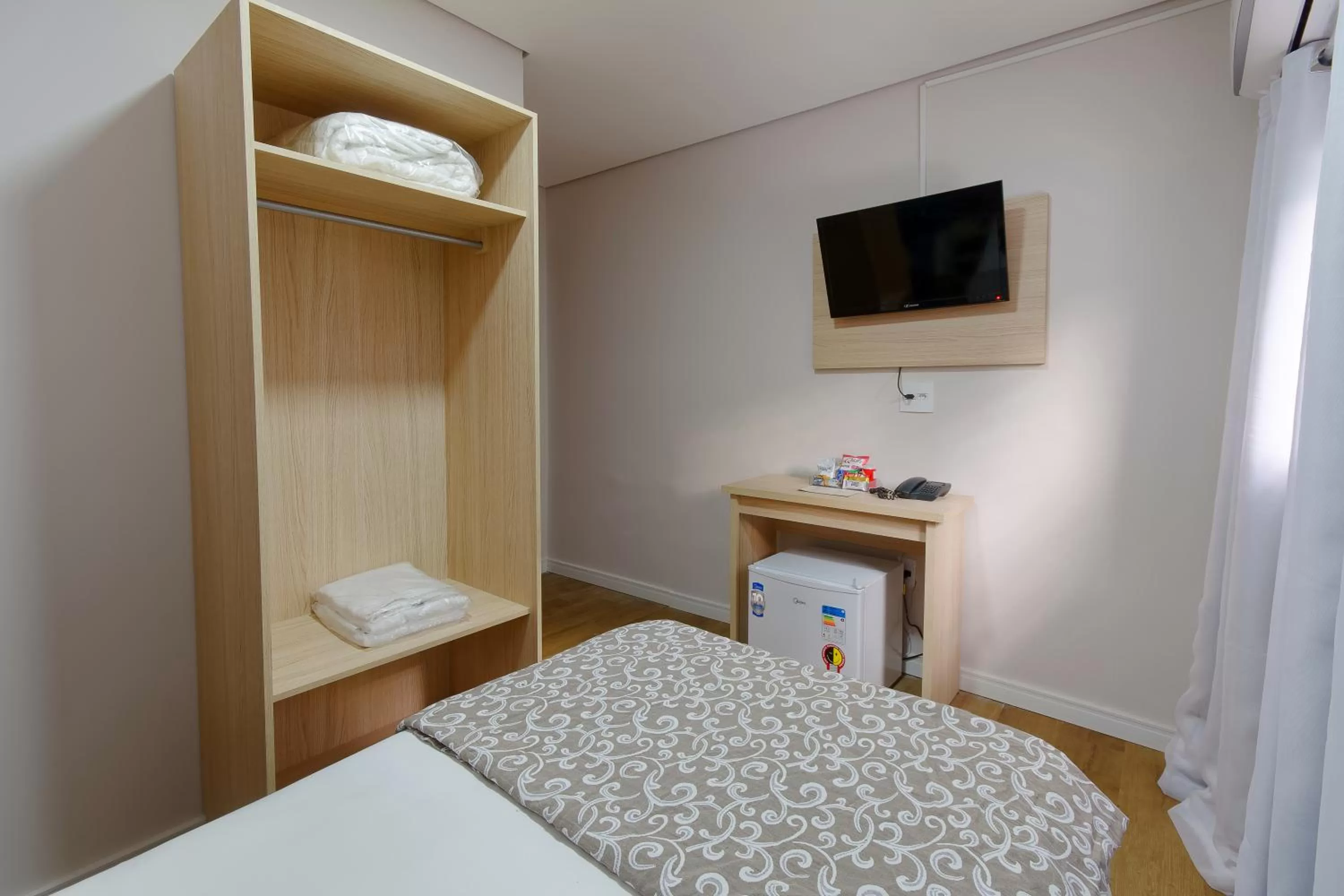 Bed in Fênix Hotel Bom Retiro