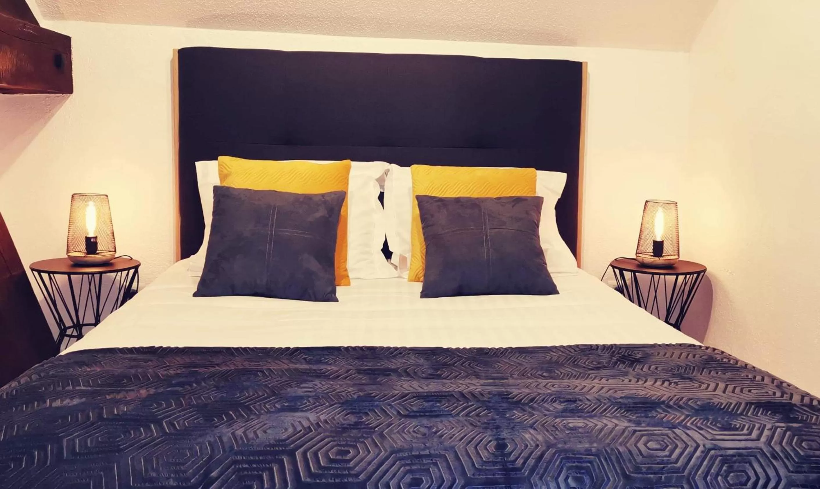 Bed in Logis Hotel La Tourelle du Beffroi