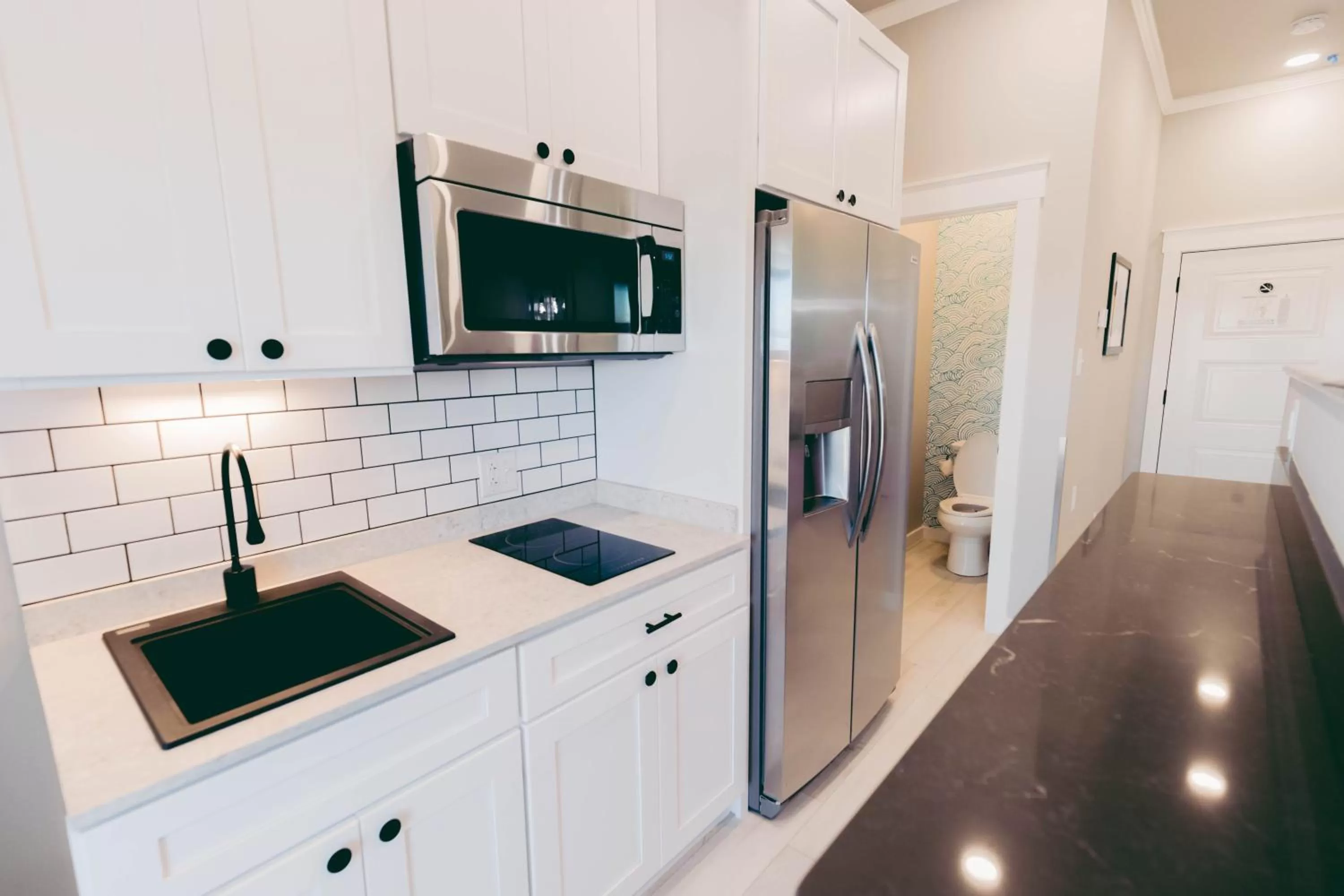 Kitchen or kitchenette in River Sirens Hotel-Contactless Check in Hotel