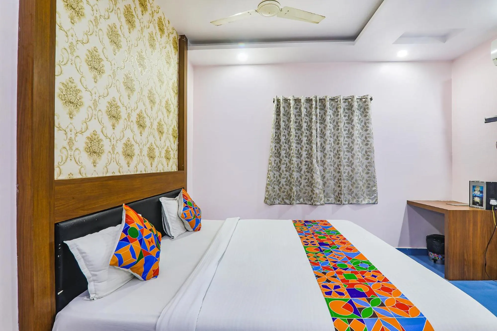 Bed in FabHotel Astor