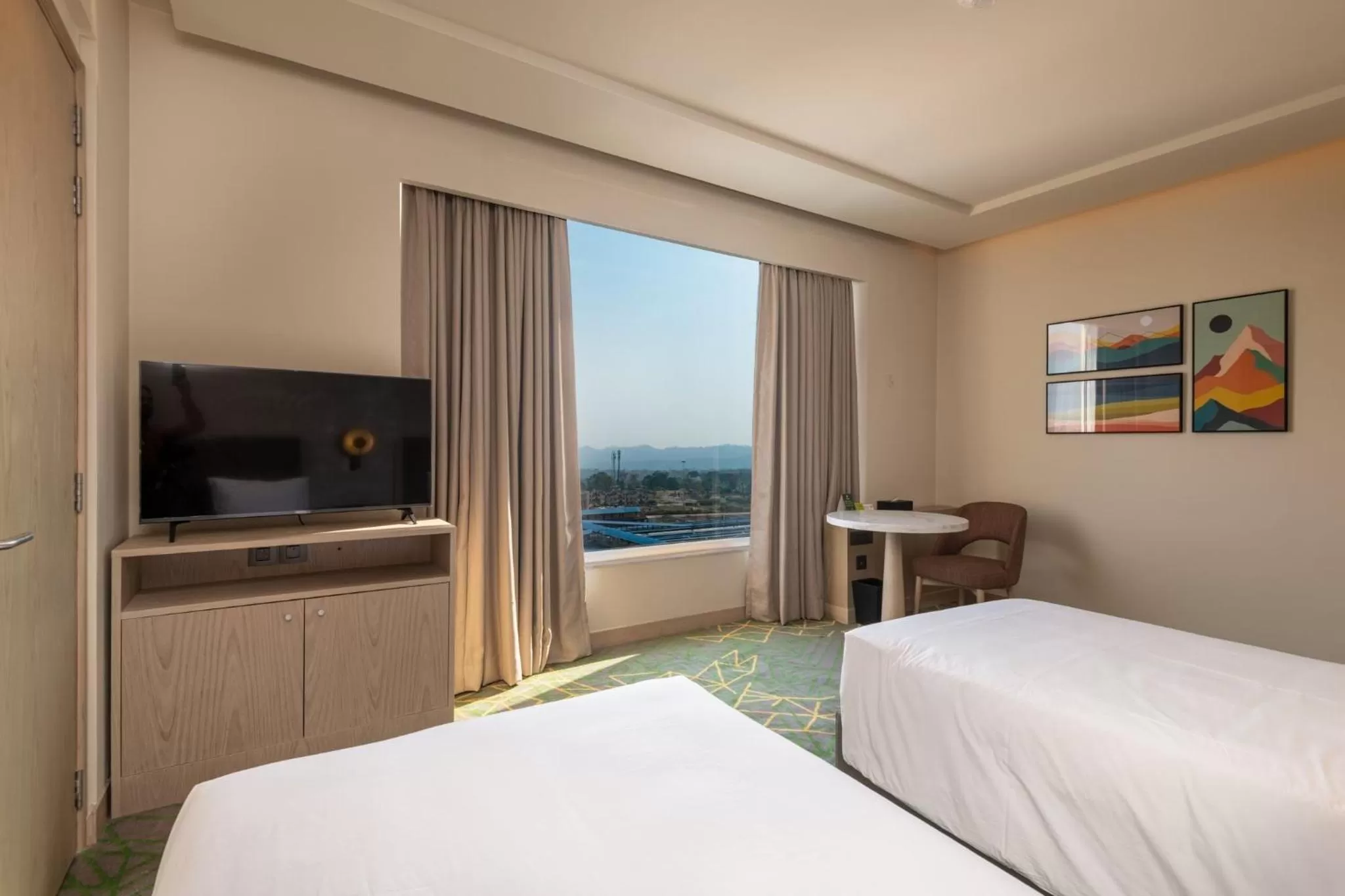 Photo of the whole room, Bed in Holiday Inn Katra Vaishno Devi by IHG