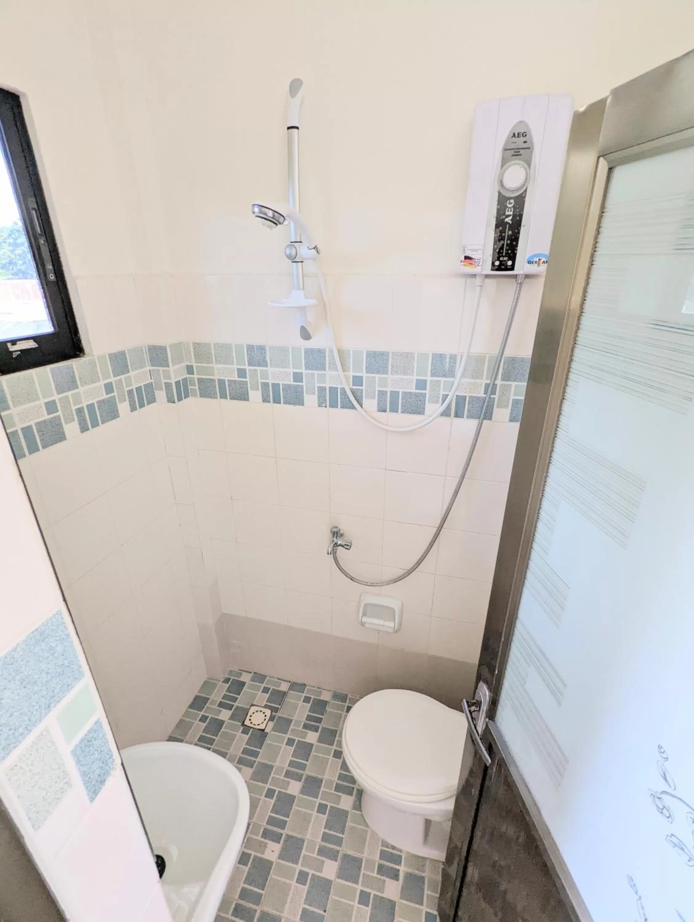 Bathroom in Charlina Inn Panglao