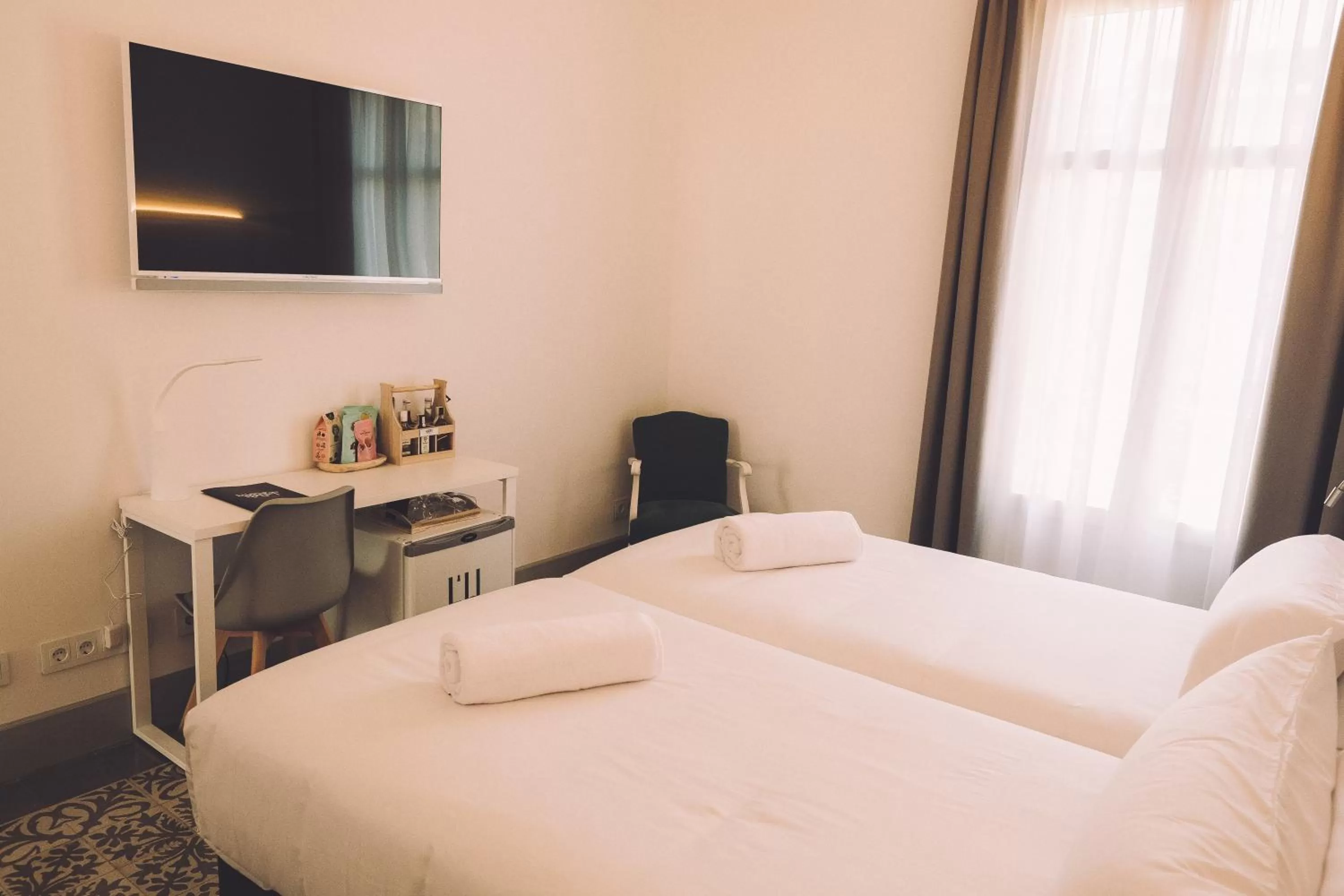 TV and multimedia, Bed in Hotelet Casa Padró