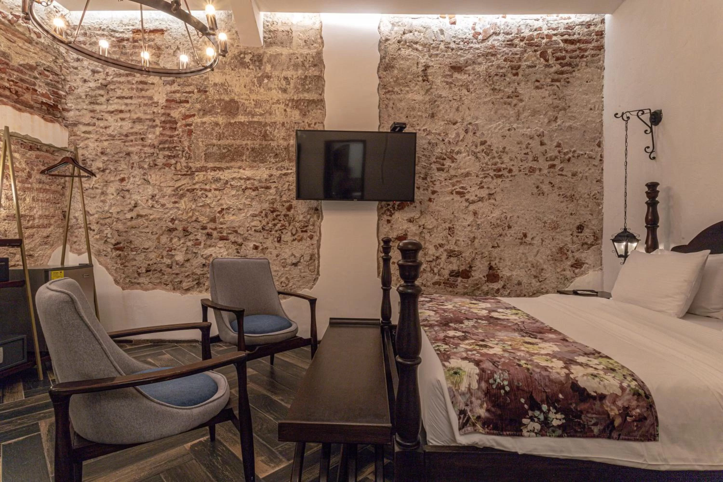 Photo of the whole room, Bed in Soy Local Insignia