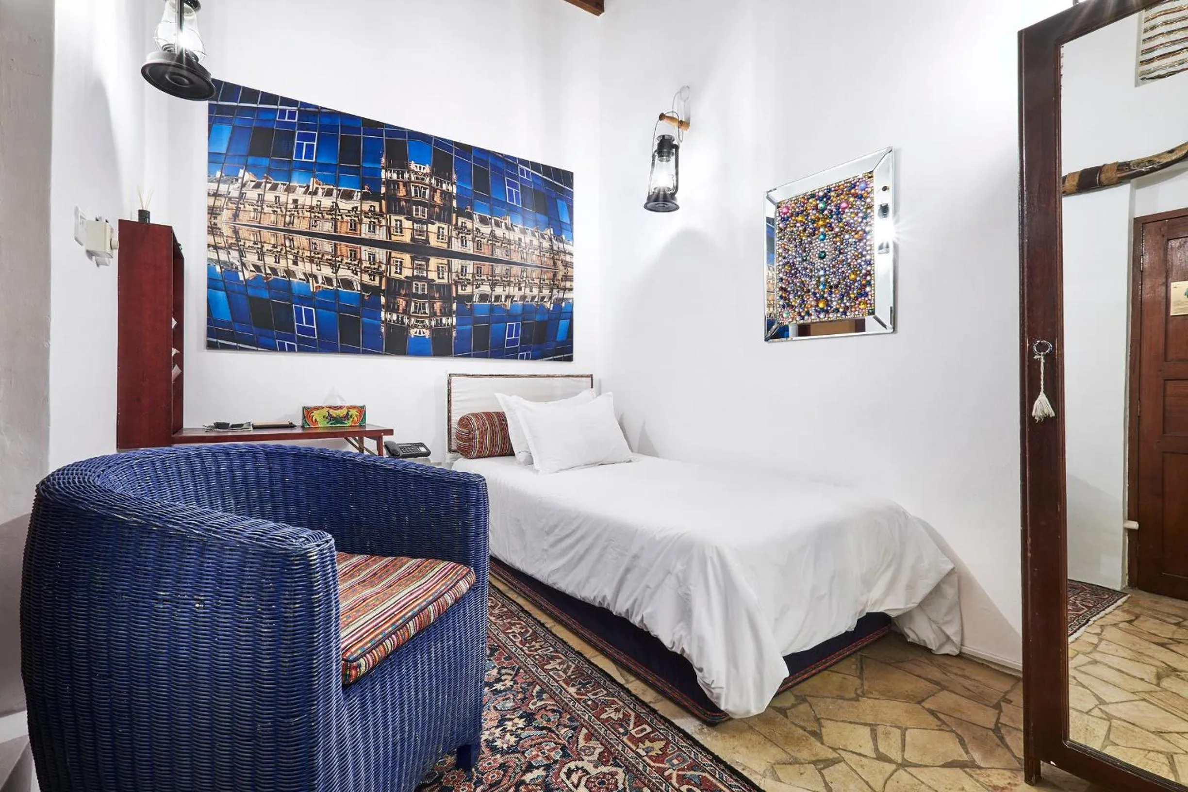 Decorative detail, Bed in XVA Art Hotel