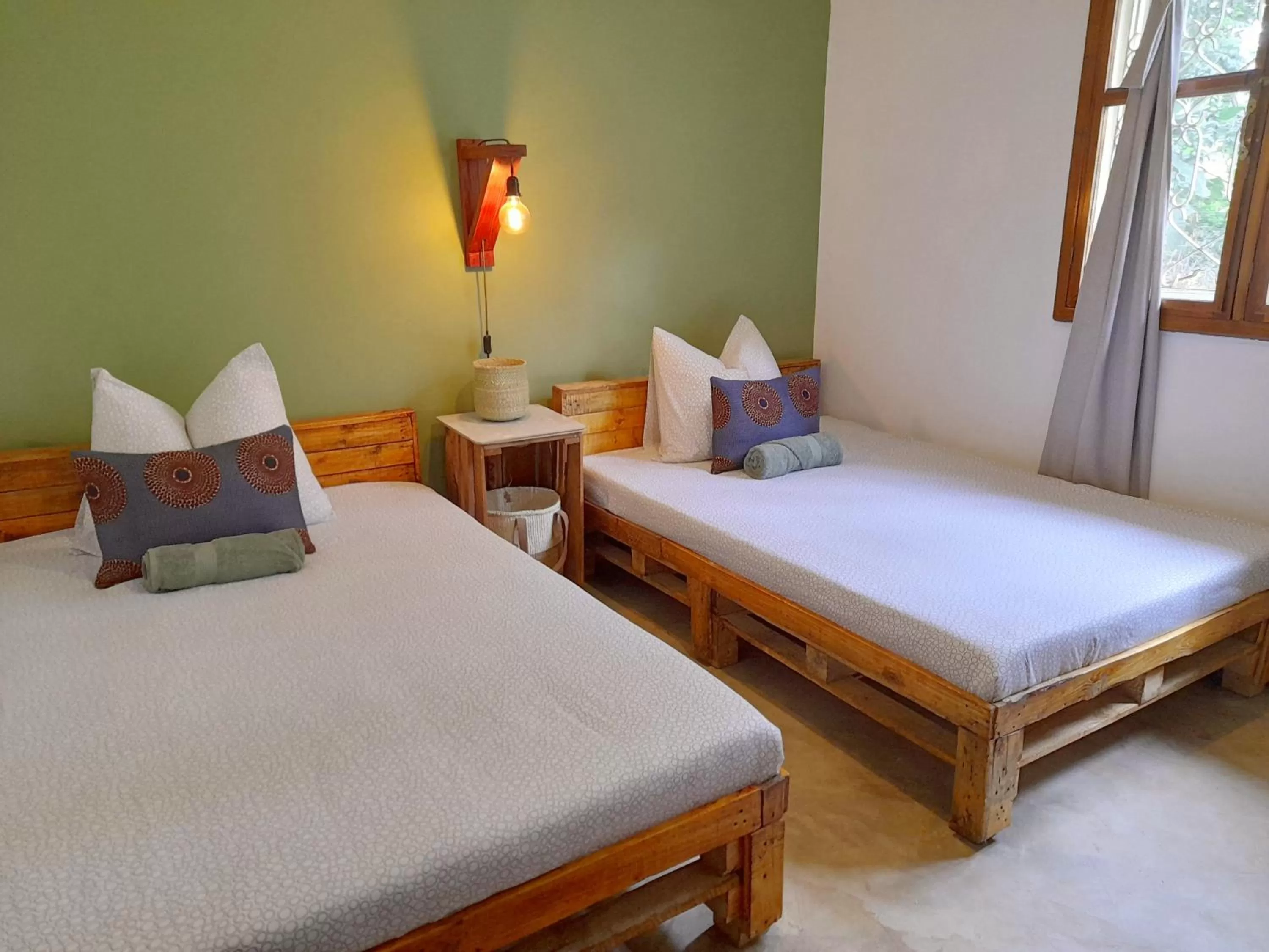 Bed in Utamaduni House B&B