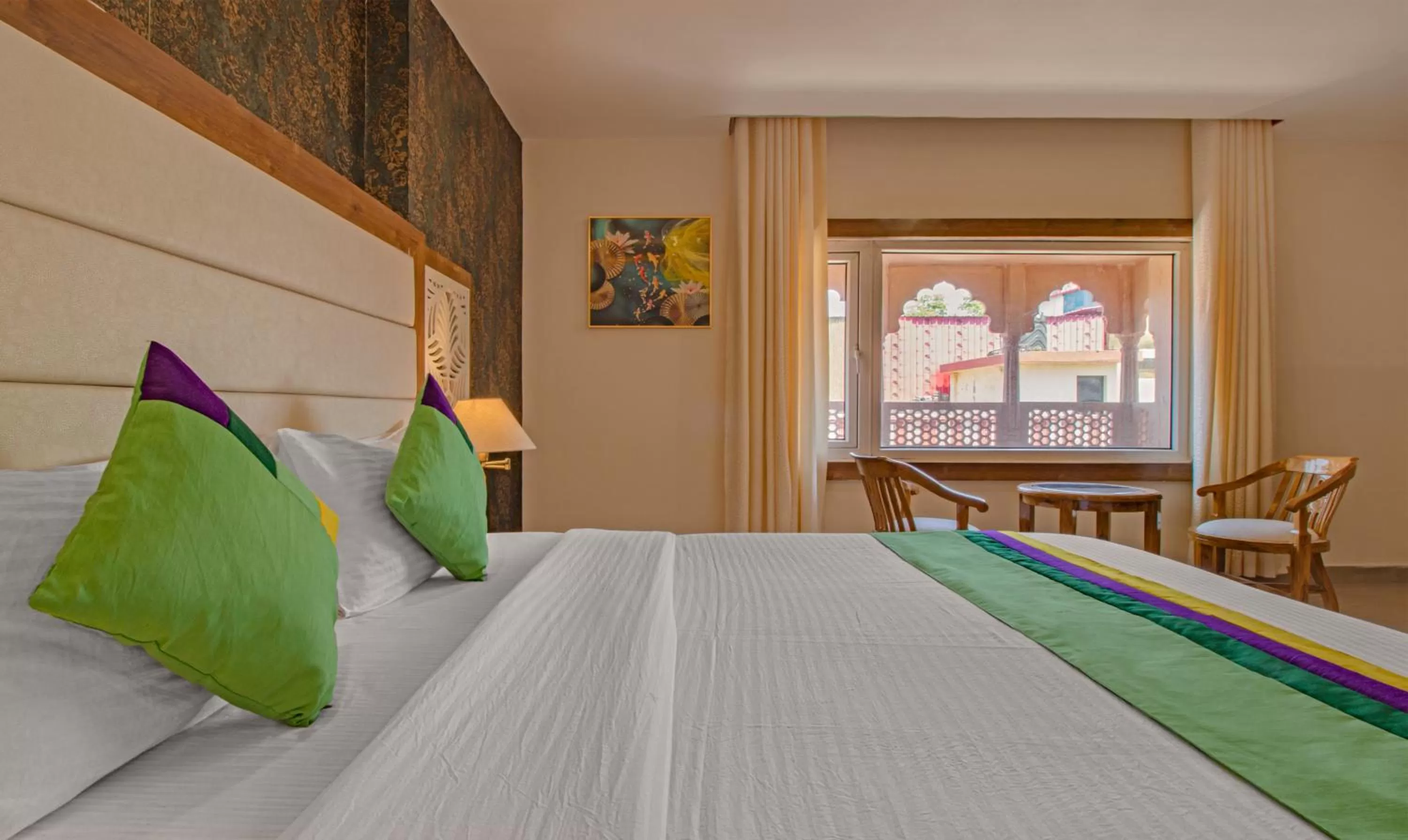 Bed in Treebo Trend Haveli Resort Roots Bhupatwala