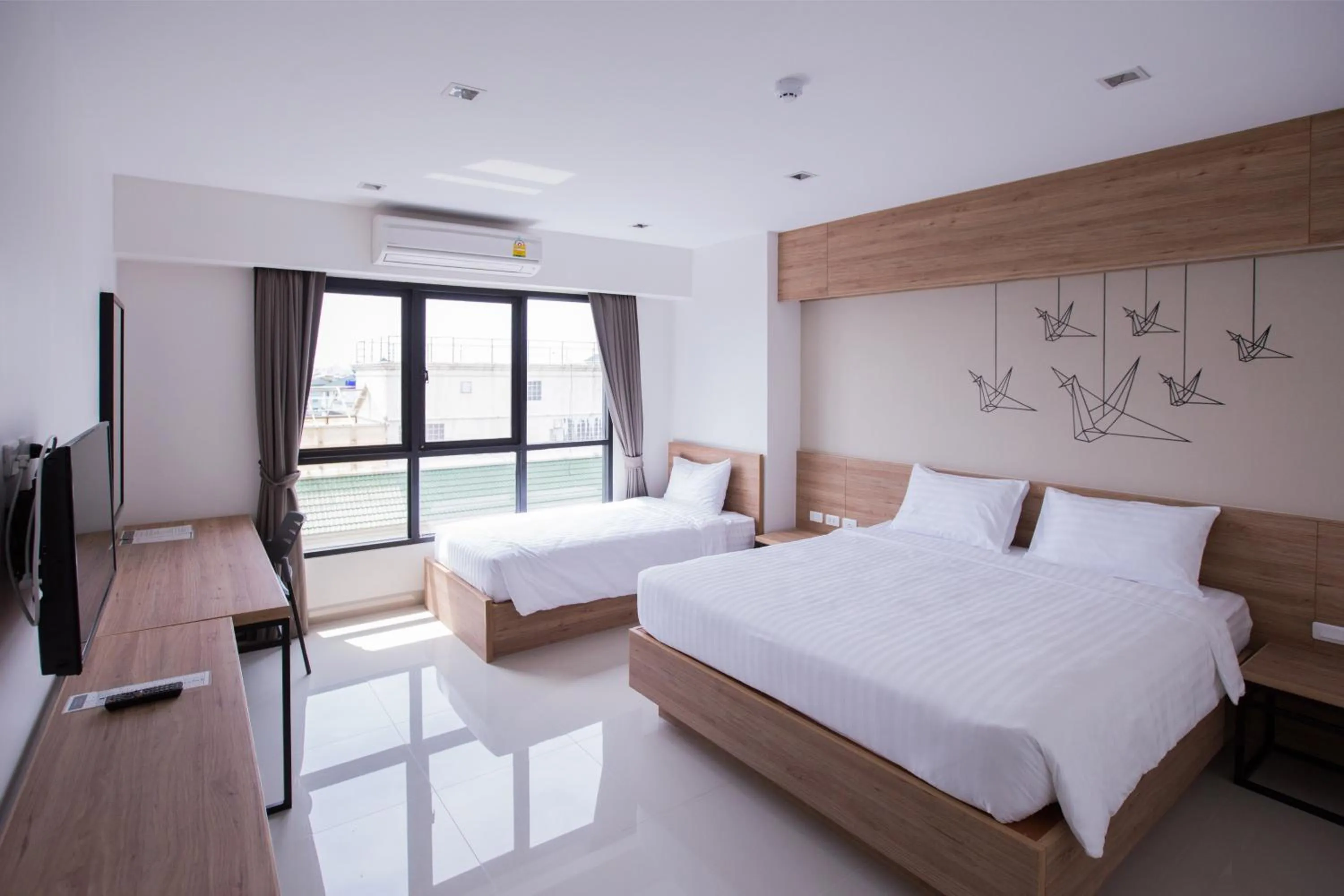 Triple Room in The Journey Hotel Laksi