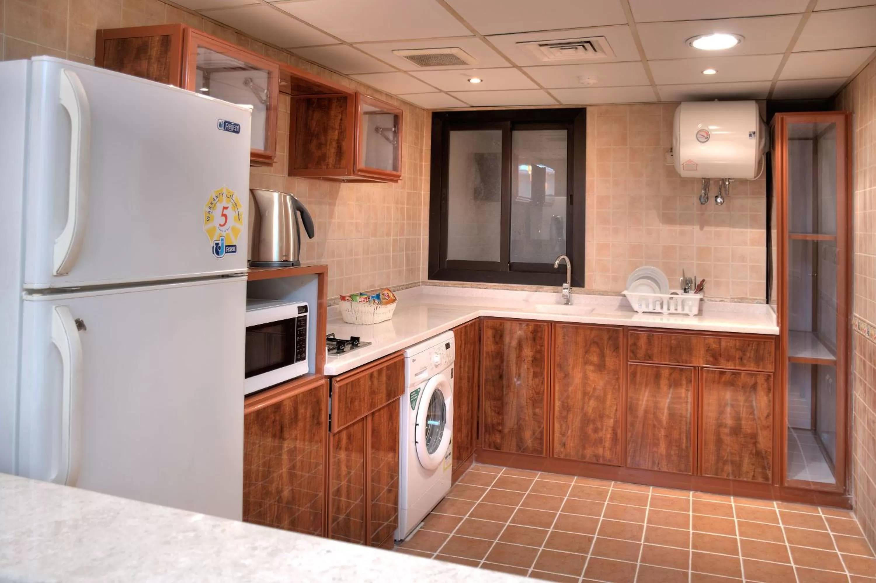 Living room, Kitchen/Kitchenette in Safari Hotel Apartment (Formerly Ewa Safari)