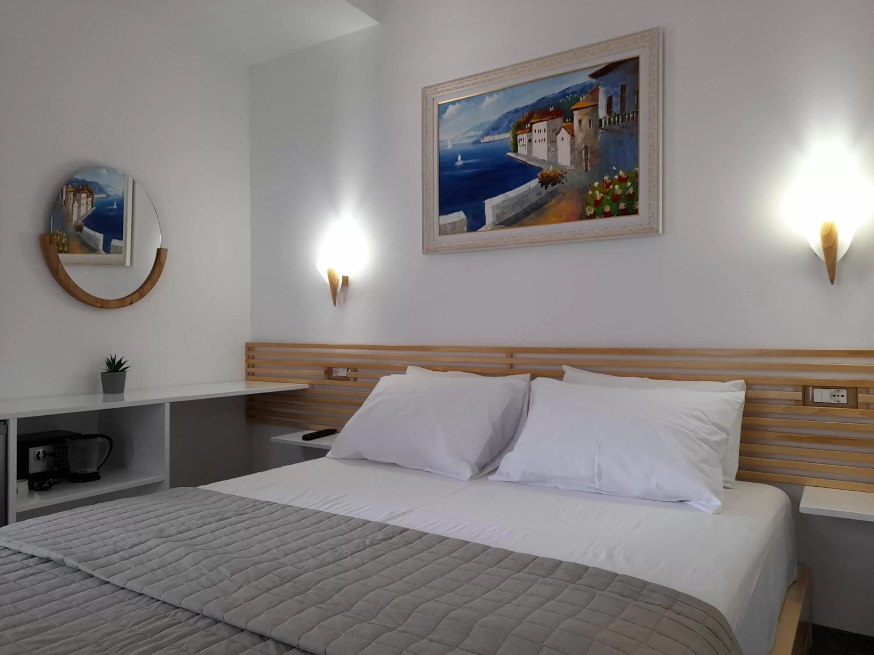 Bed in Anxhelos Hotel