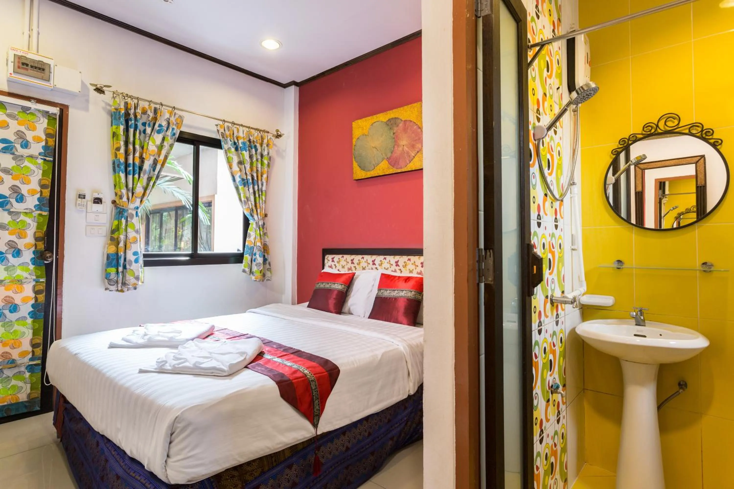 Bed in PloyKhumThong Boutique Resort