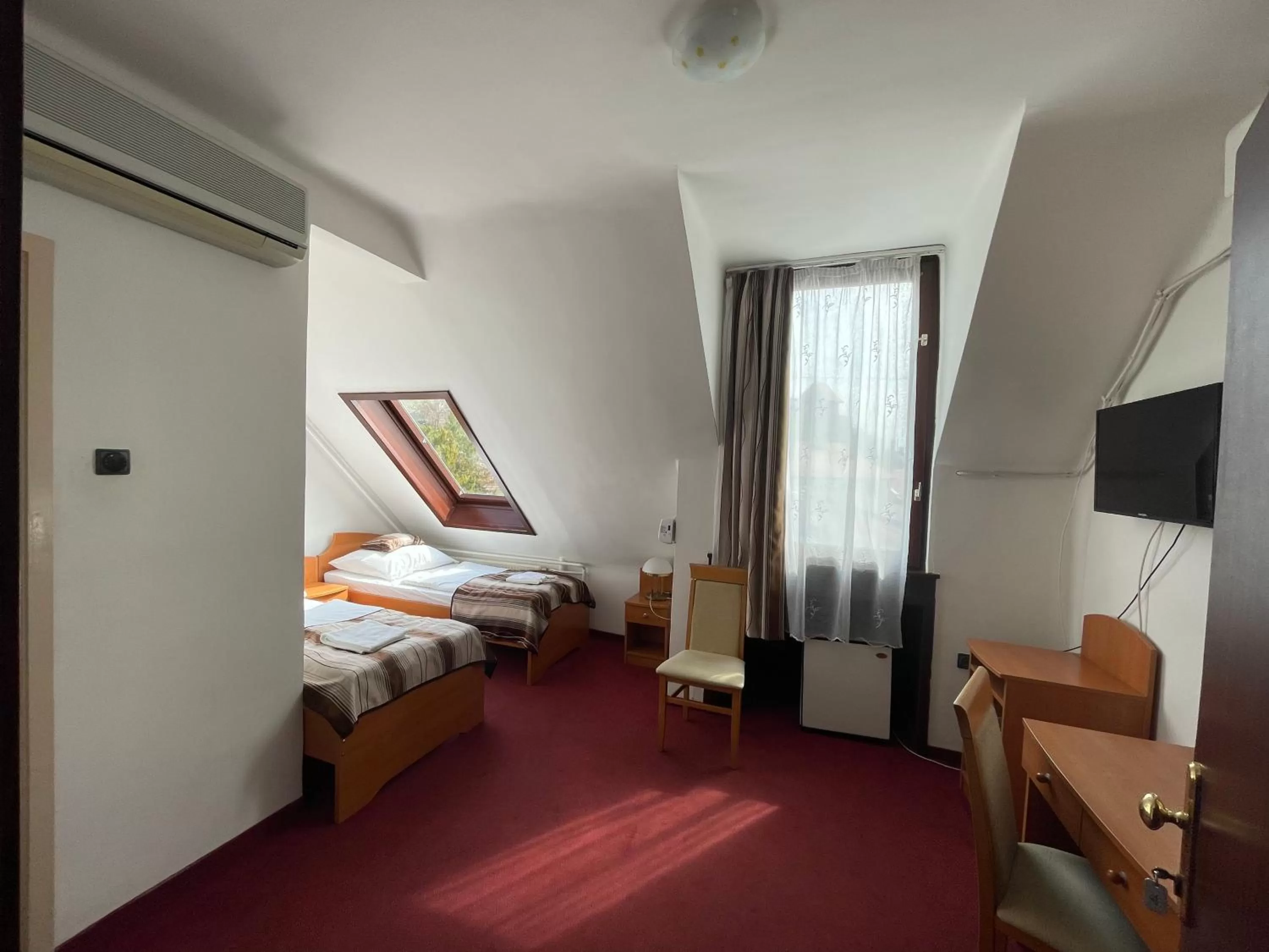 Bed in Hotel Minaret&Étterem