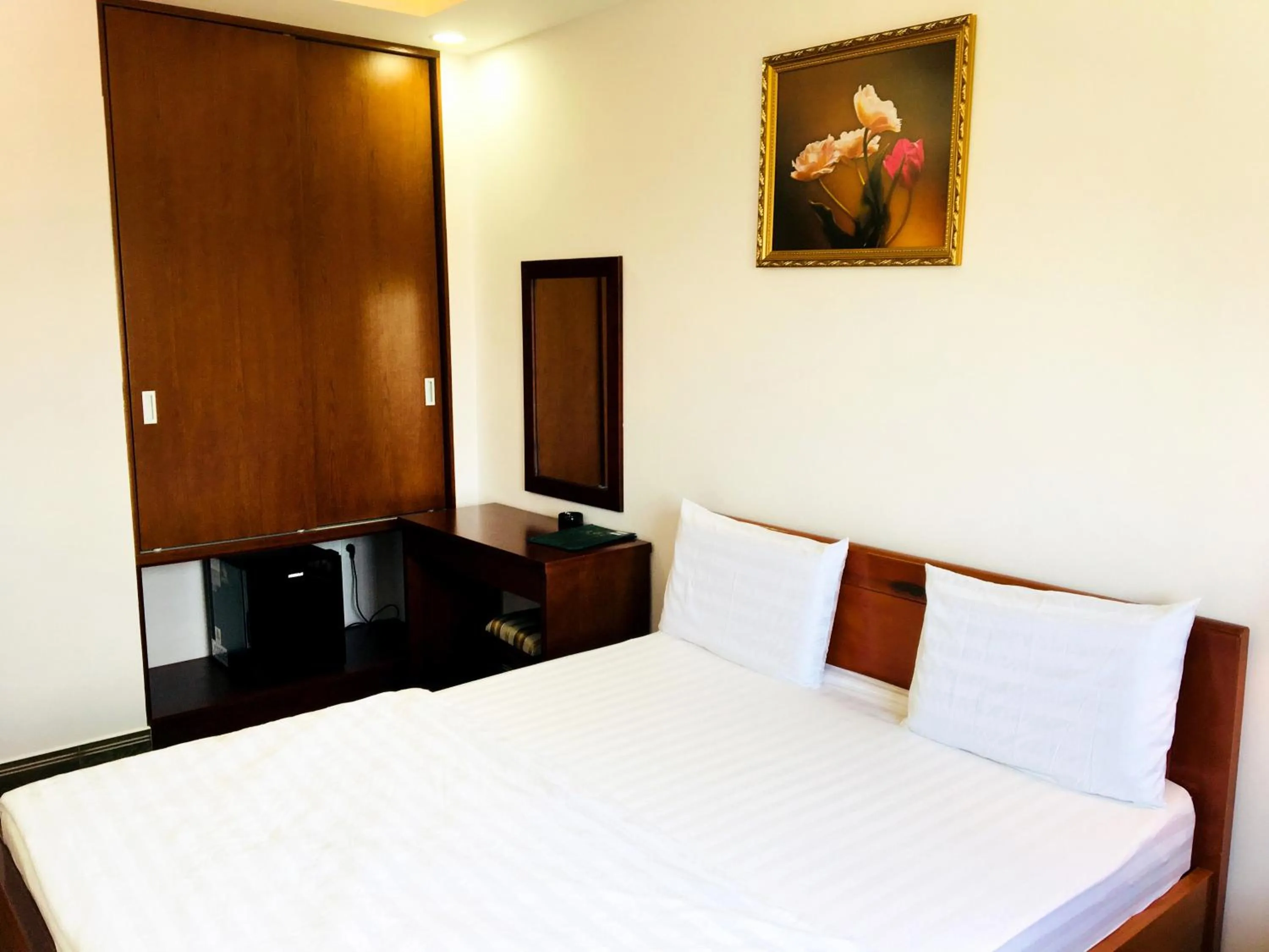 Bed in QUEEN VICTORIA Hotel