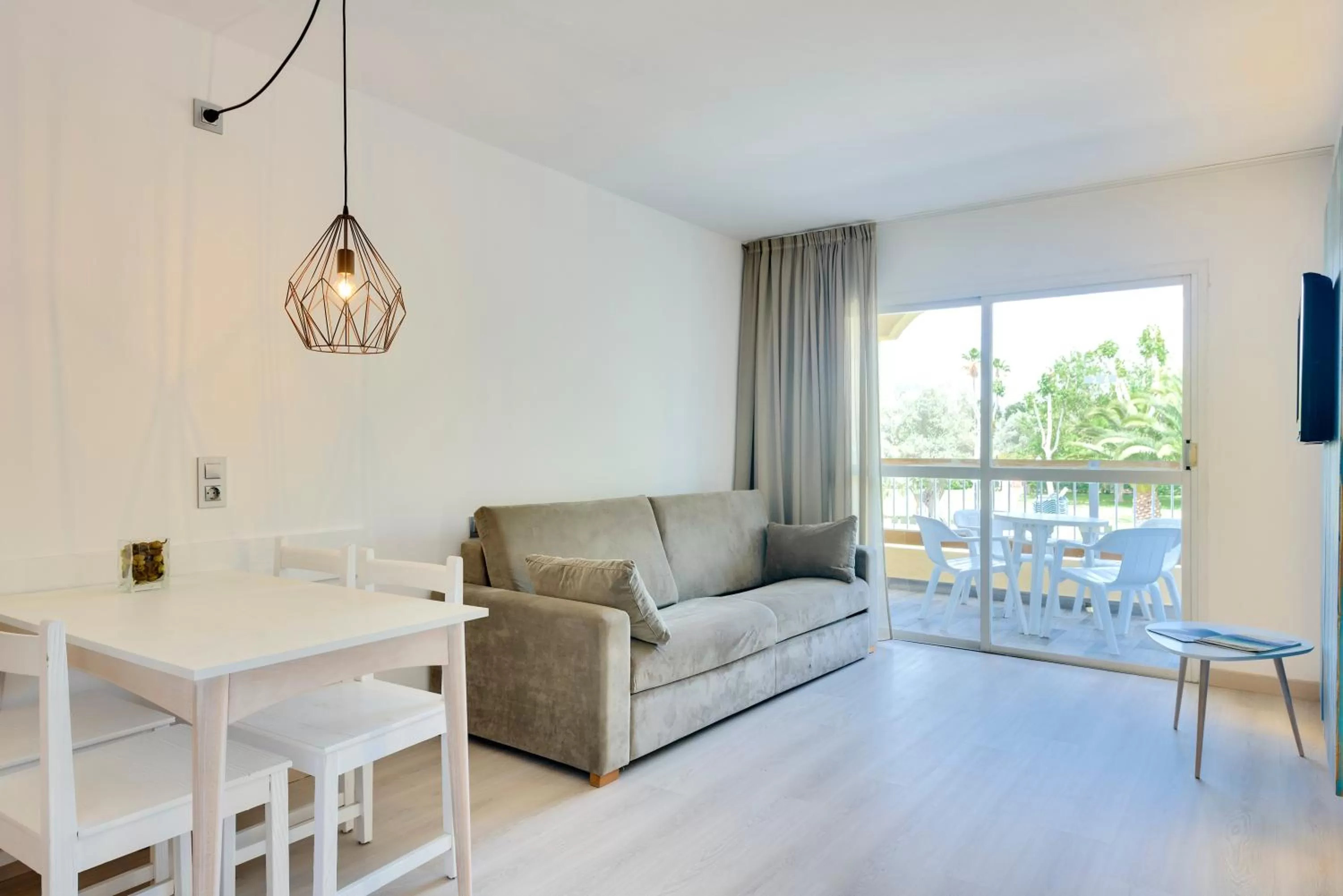 Living room in Alcudia Garden Aparthotel