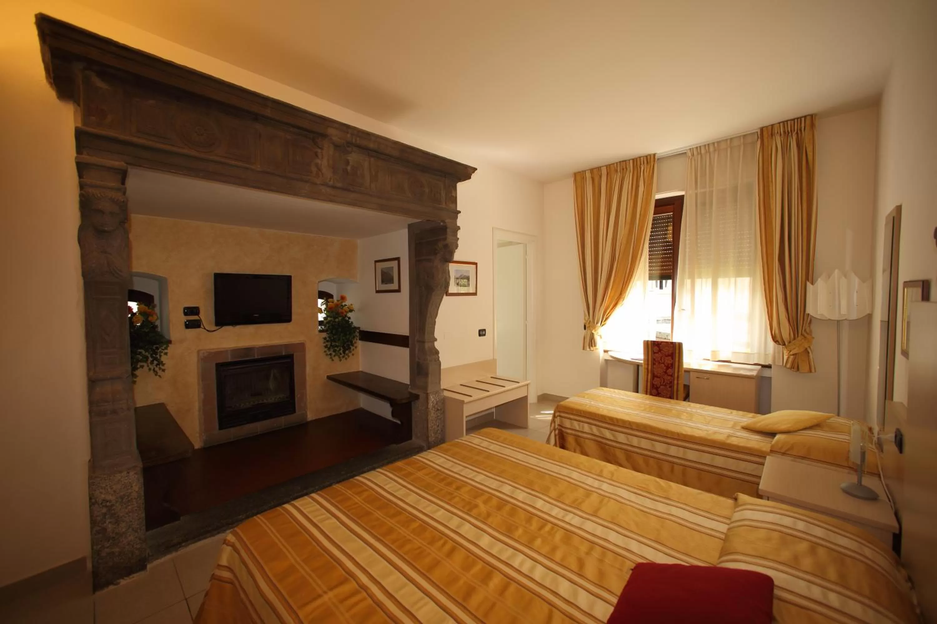 Photo of the whole room, Bed in Hotel Fioroni