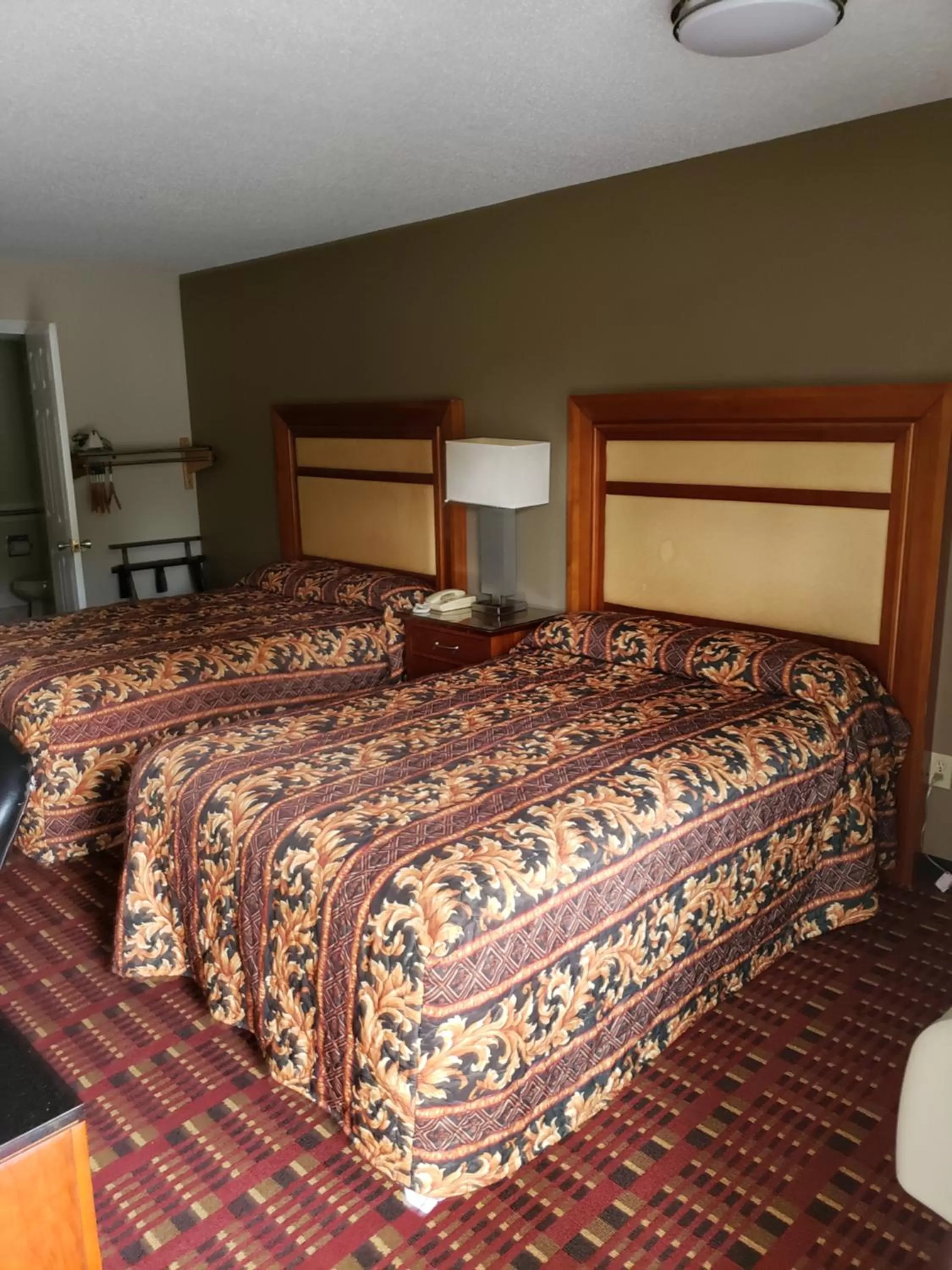 Bed in Peach Tree Inn