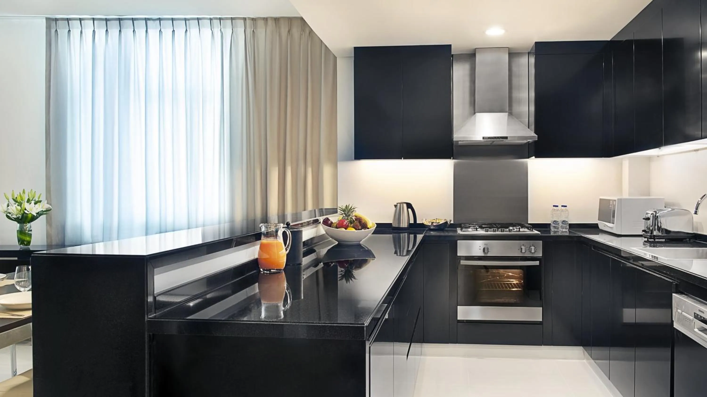 Kitchen or kitchenette in DAMAC Maison Cour Jardin