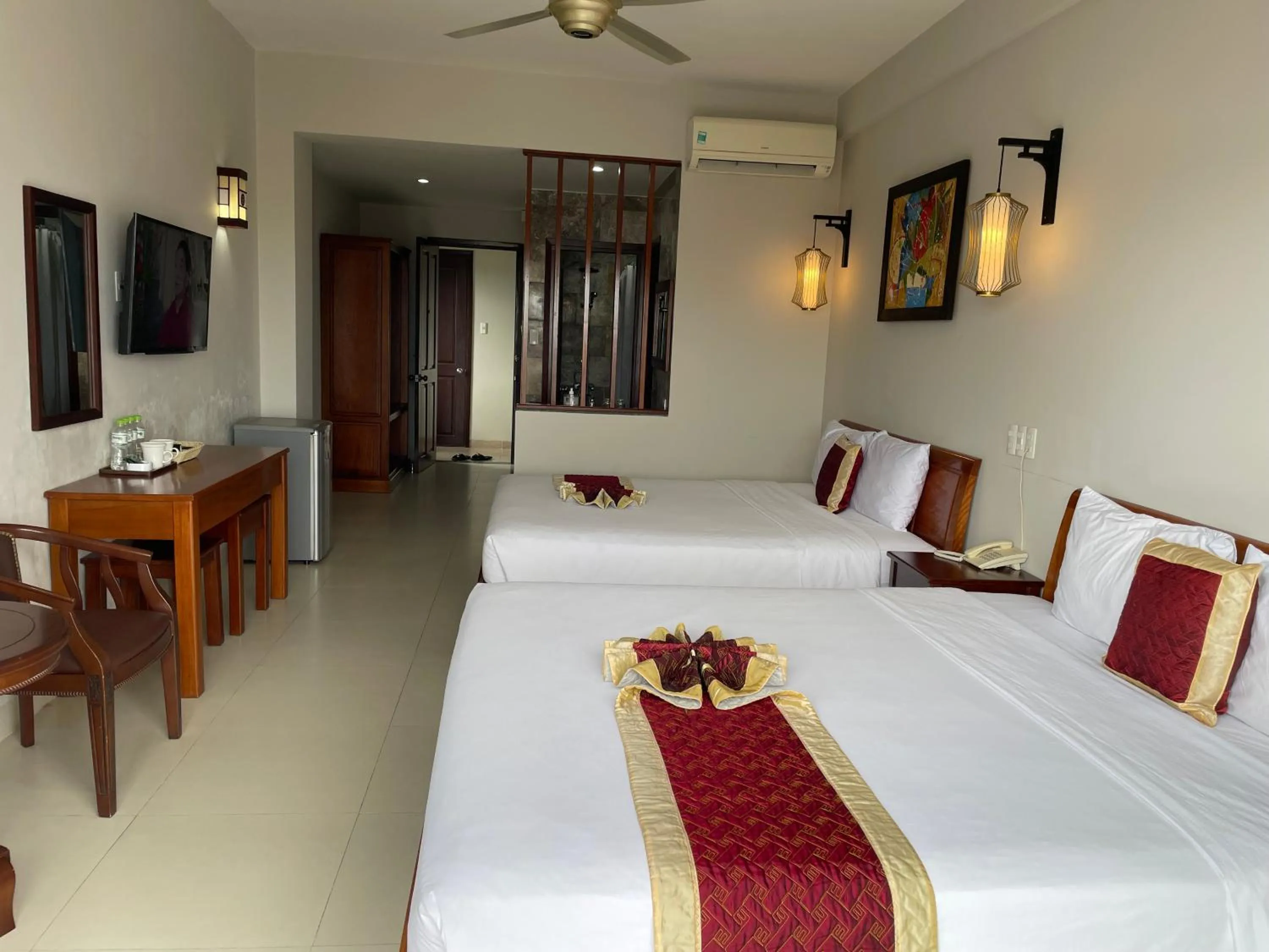 Bed in Sunshine Hoian Hotel