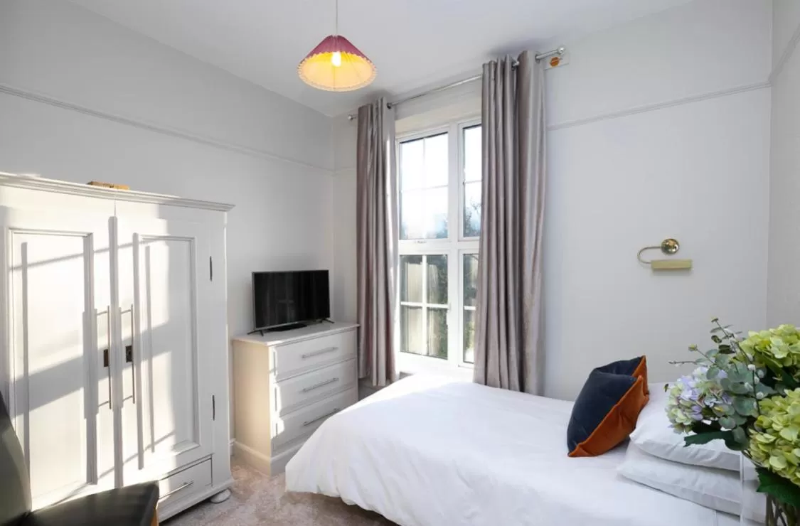 Bed in Pages Hotel and Guesthouse