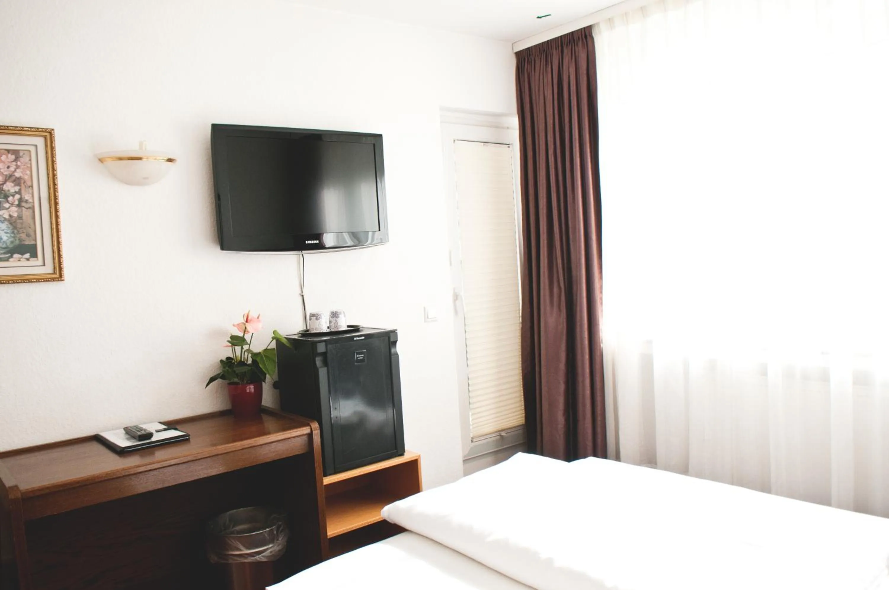 TV and multimedia, TV/Entertainment Center in Hotel Batavia