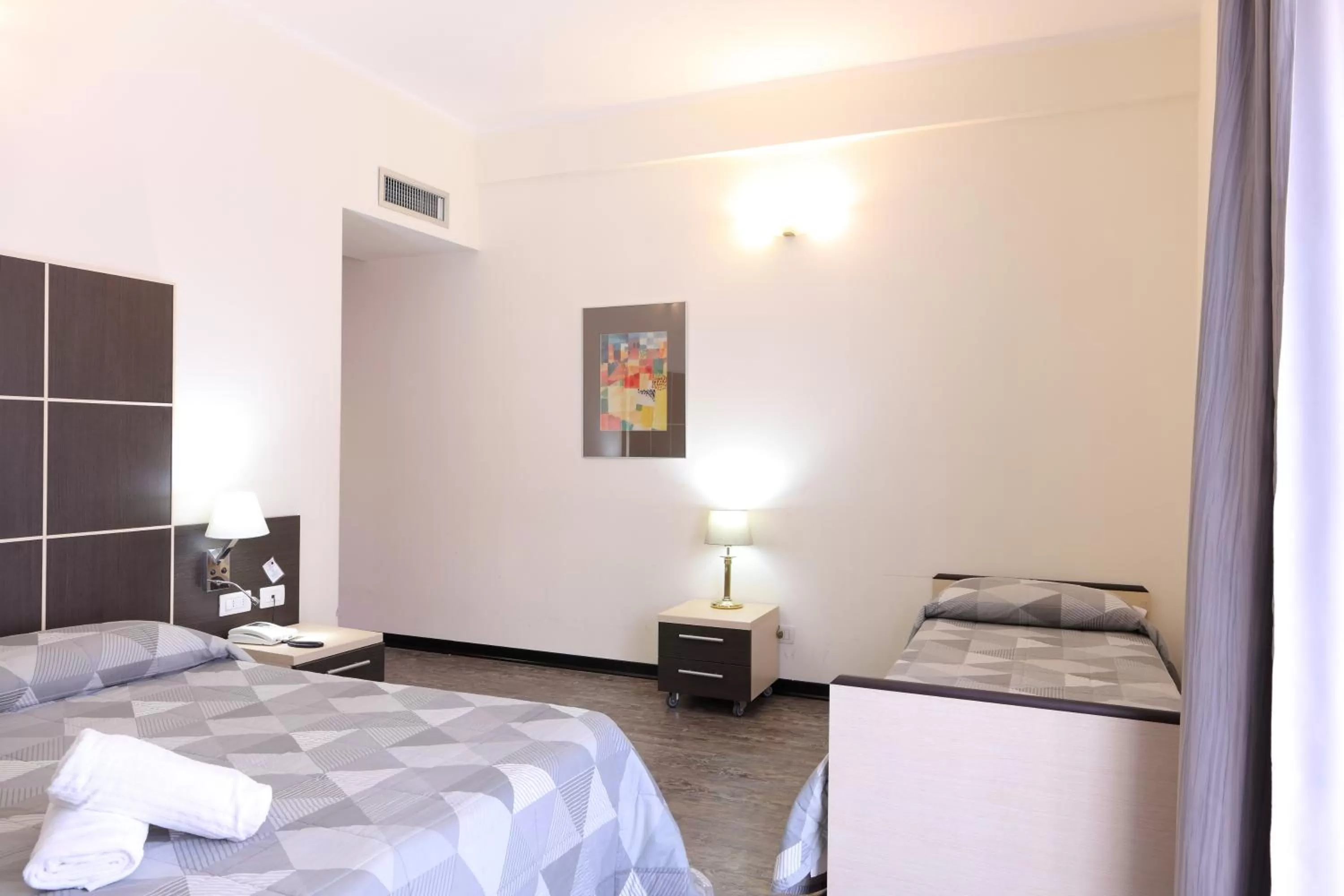 Bed in Hotel Ferrari