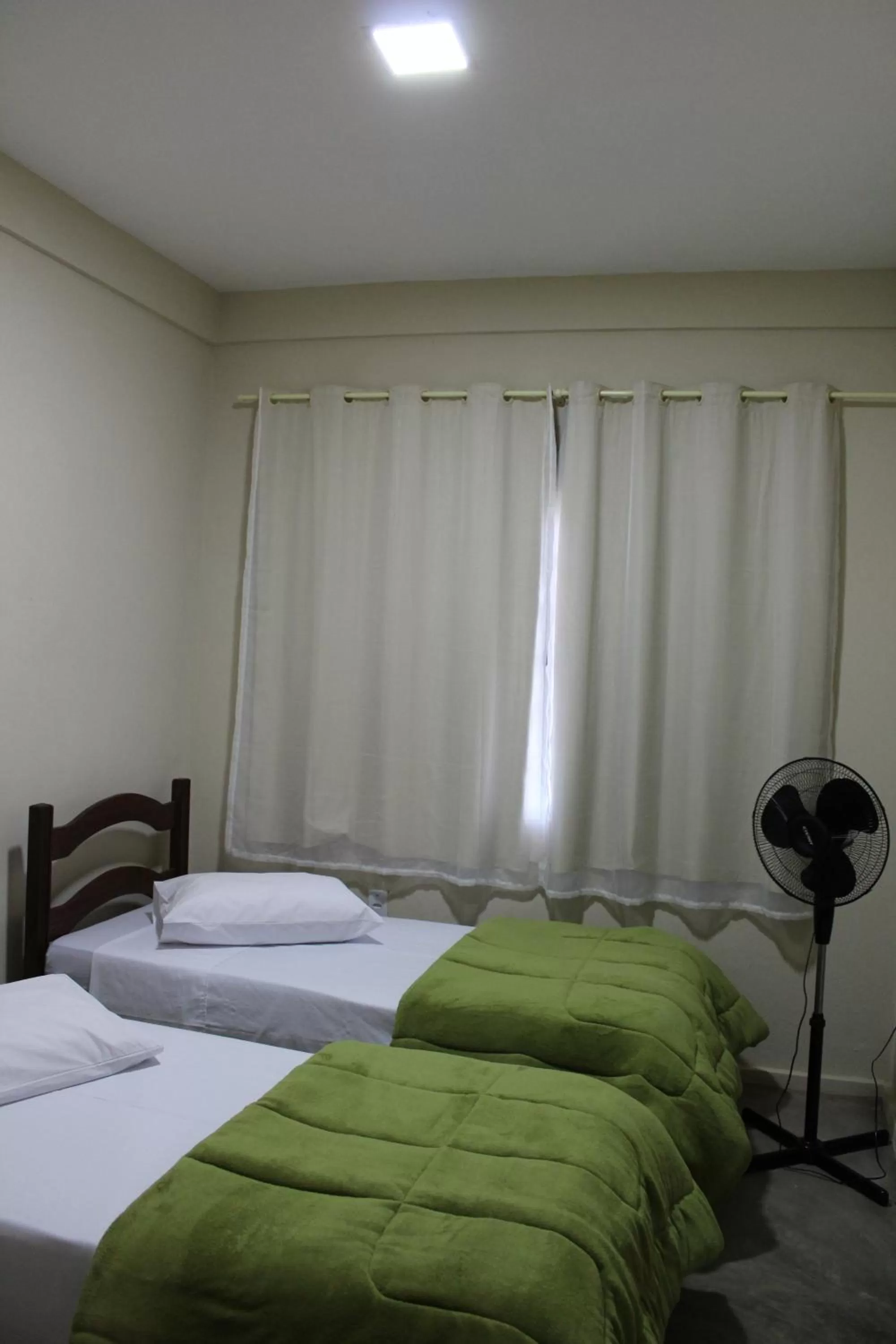 Bed in Pousada Morro dos Ventos