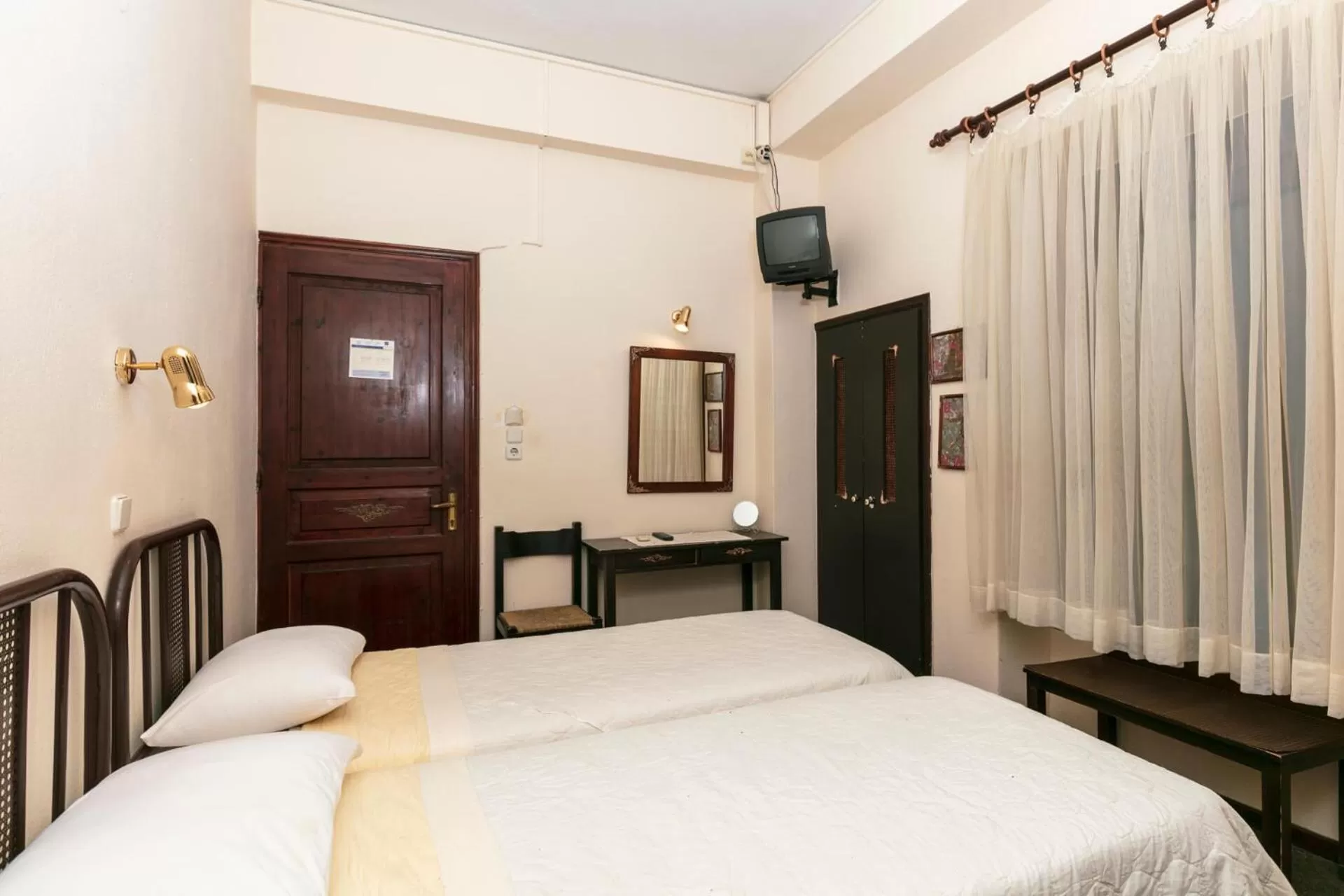 Bed in Acropolis Hotel