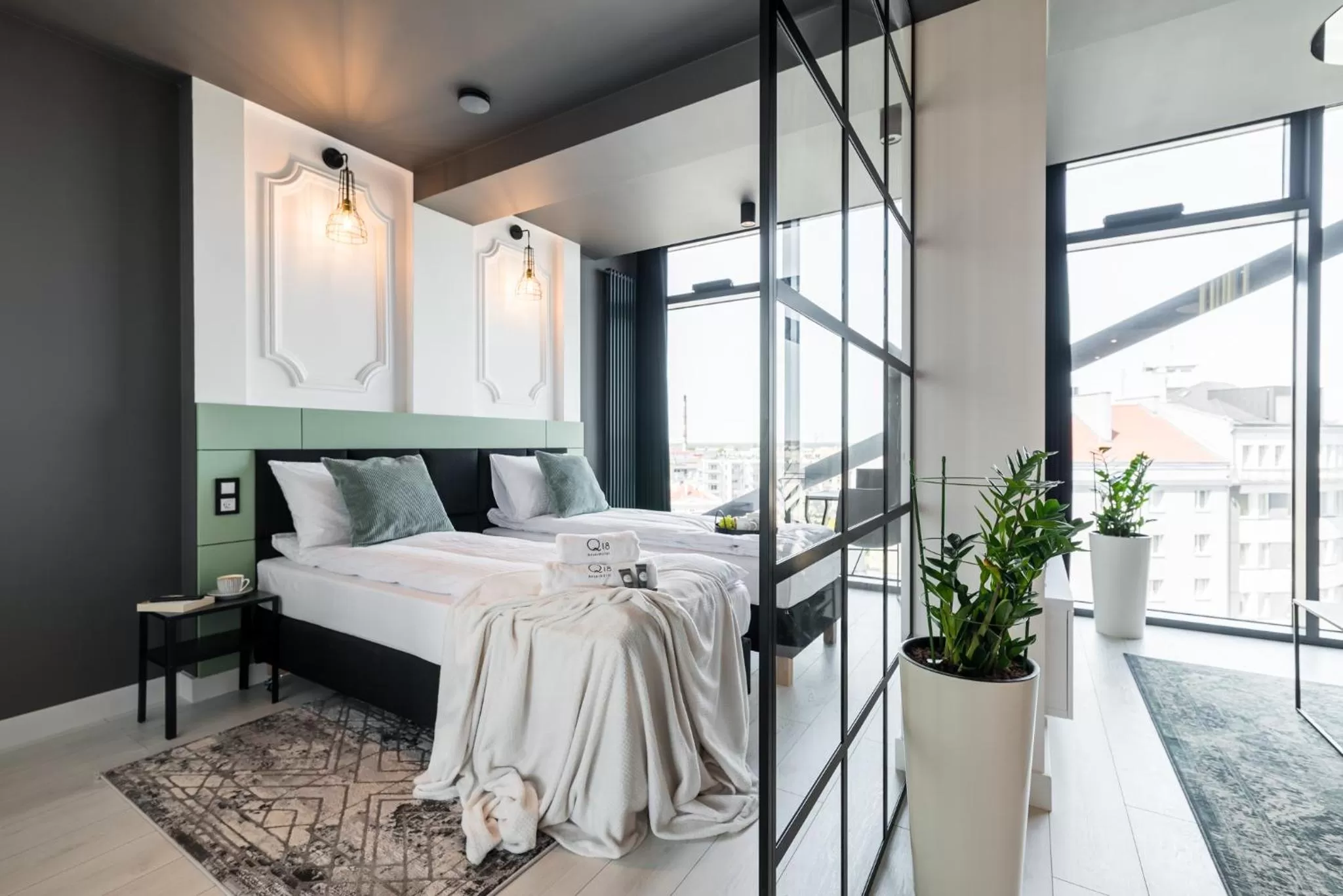 Bed in Q18 ApartHotel