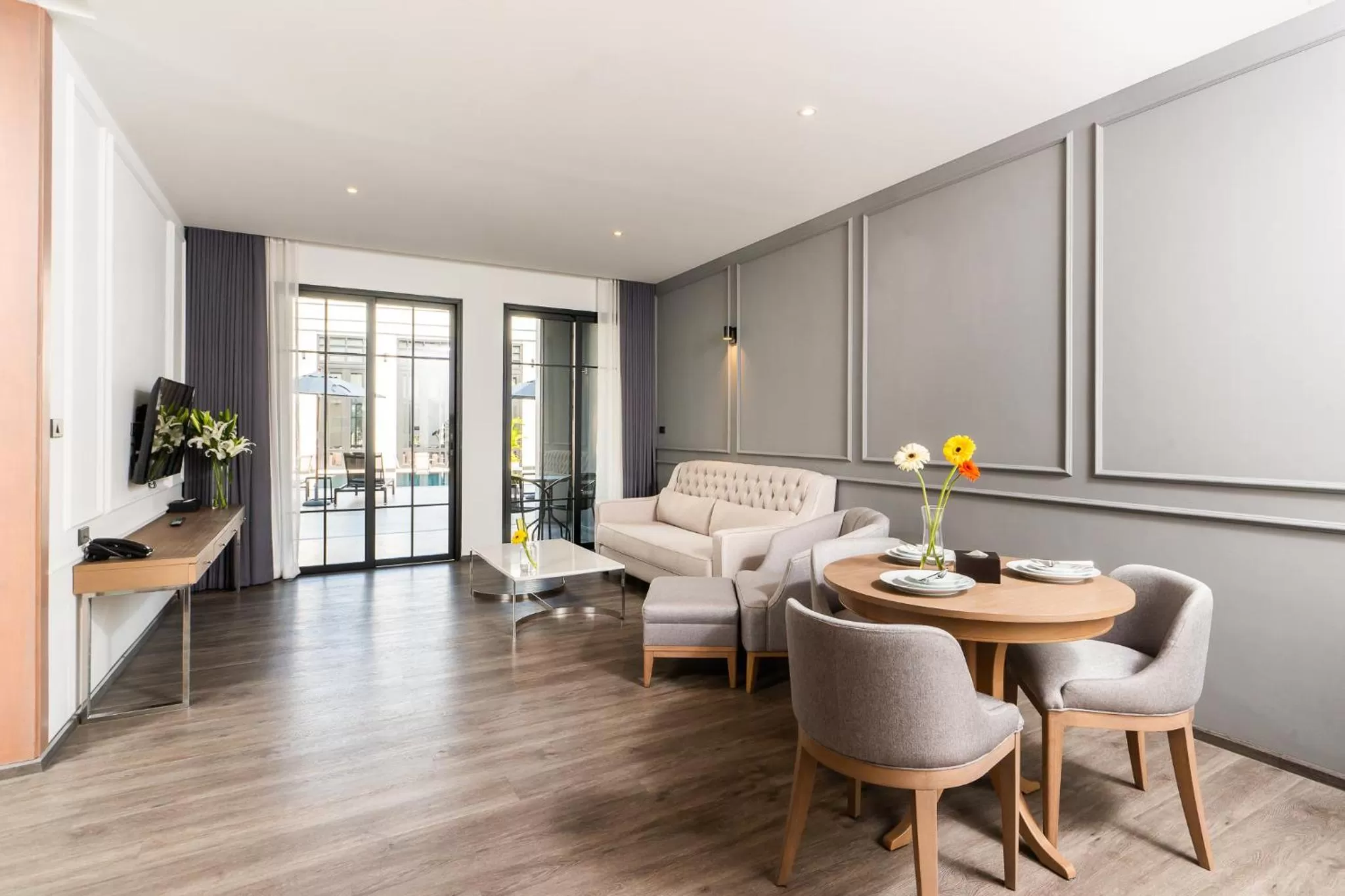 Living room in One Patio Hotel Pattaya - SHA Extra Plus