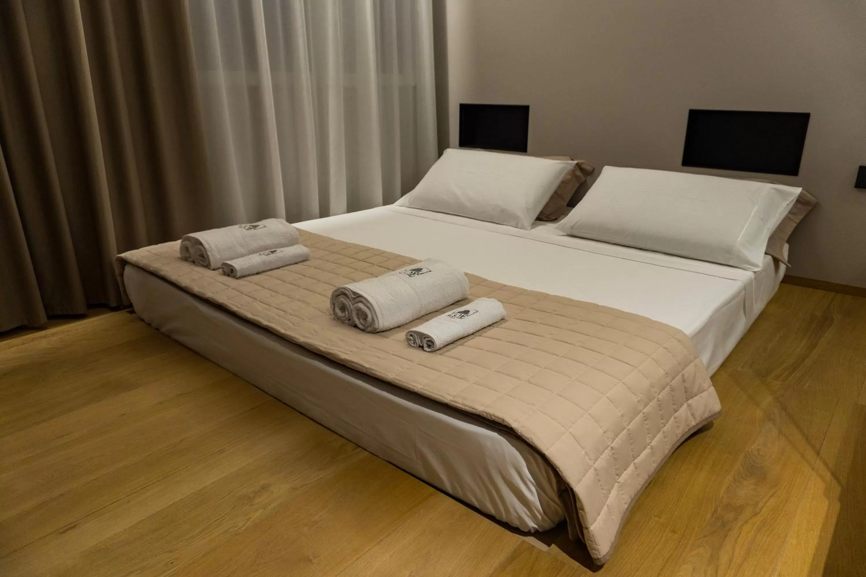 Bed in ZOE LUXURY SUITES