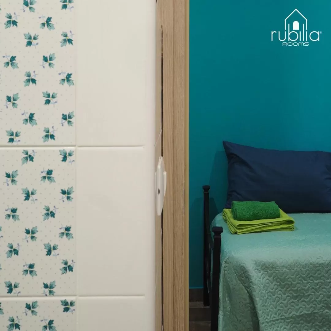 Bed in Rubilia Rooms Pompei