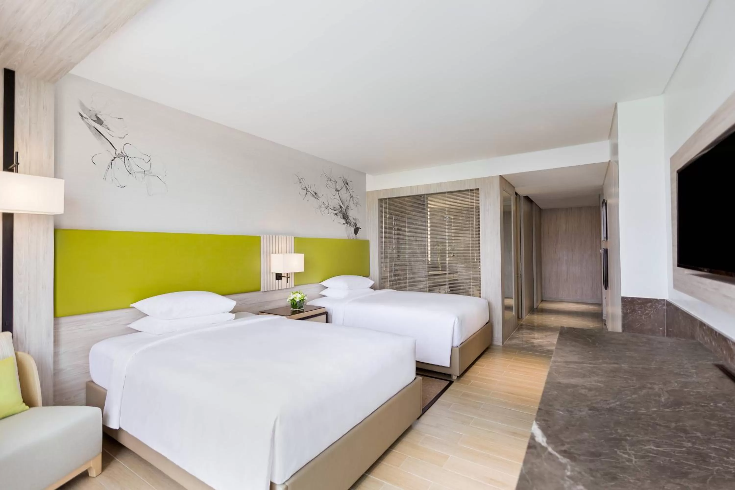 Guest Room with Two Double Beds and City View in Courtyard by Marriott Iloilo