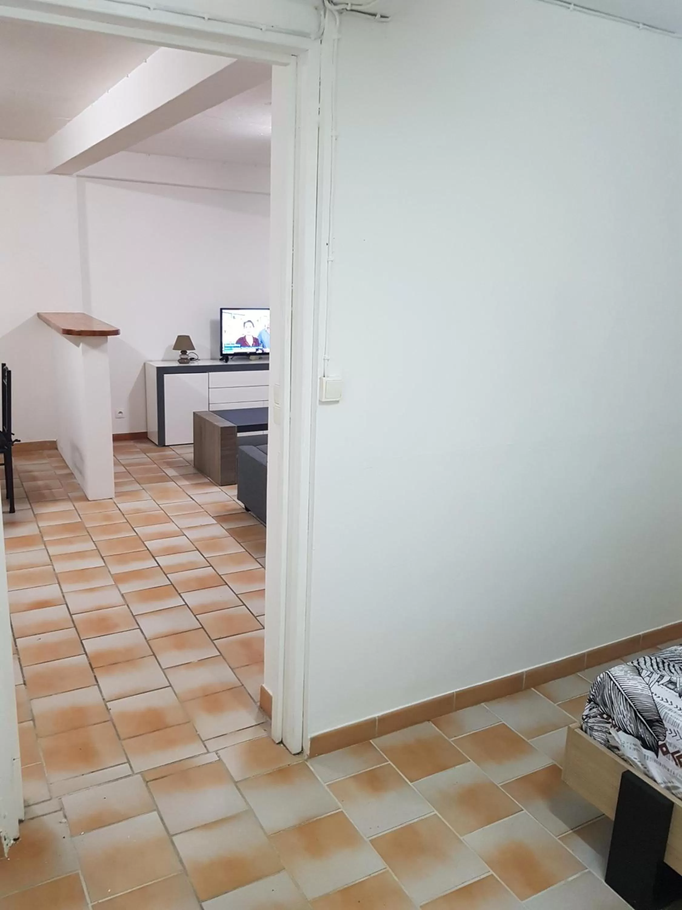 Living room, Bed in Appartement de la Baie