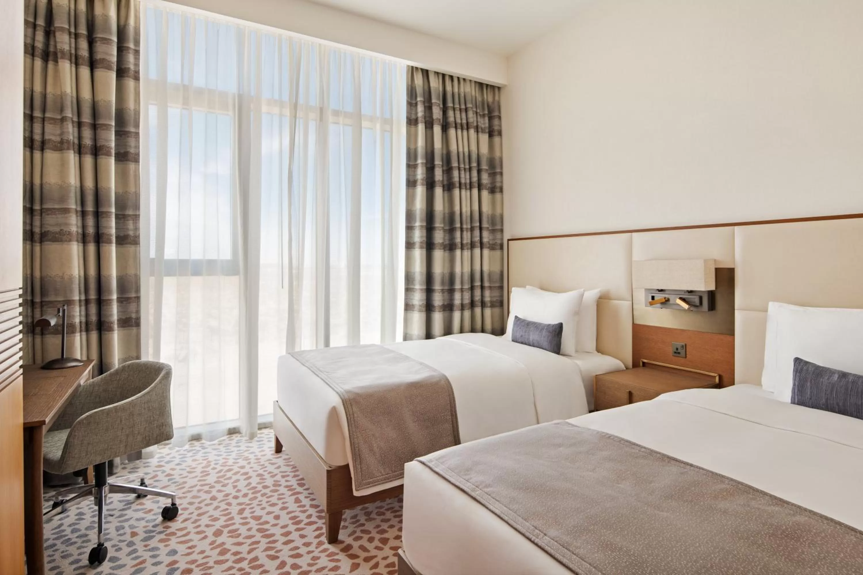 Photo of the whole room, Bed in Staybridge Suites Dubai Al-Maktoum Airport by IHG