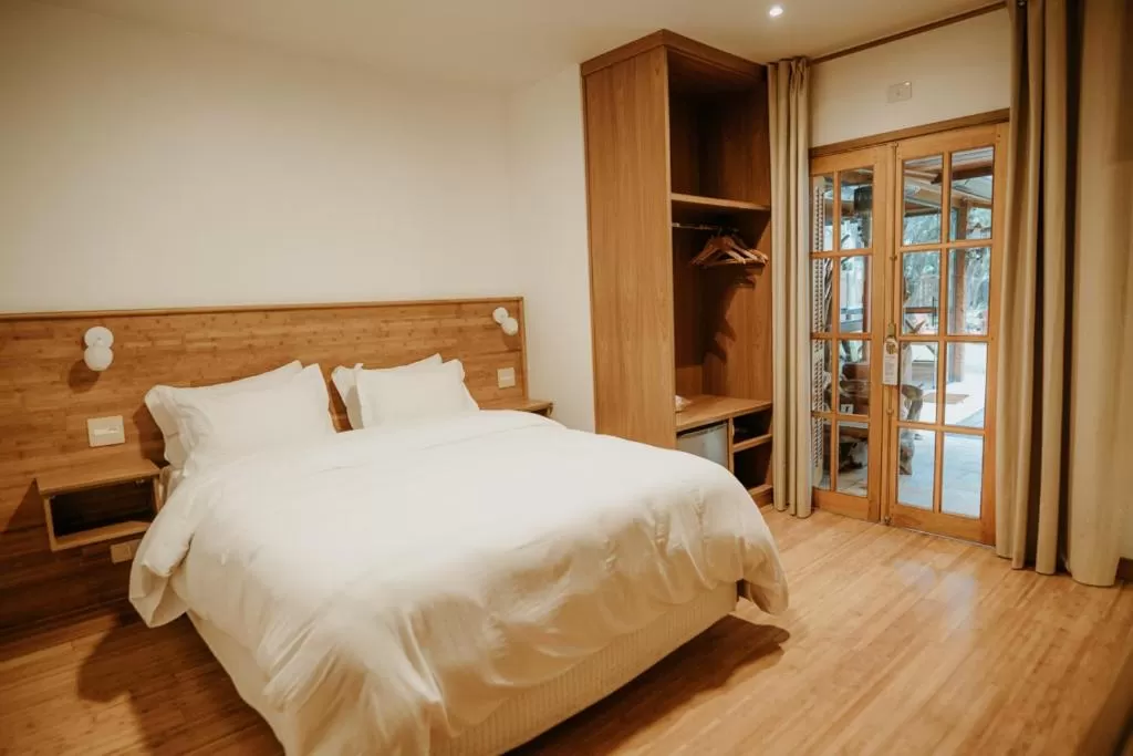 Bed in La Brume Pousada