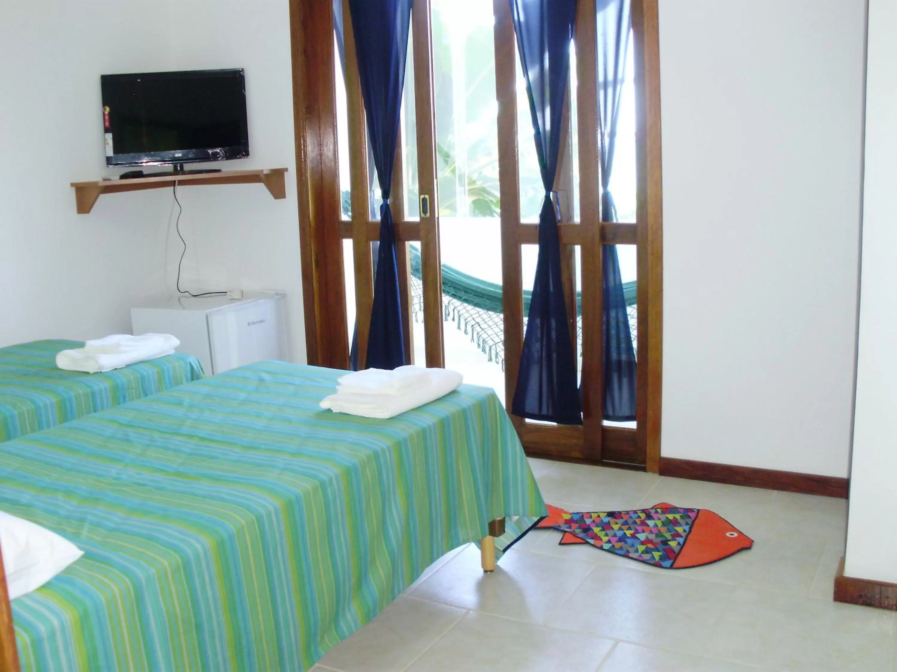 Bed in Pousada Piquara