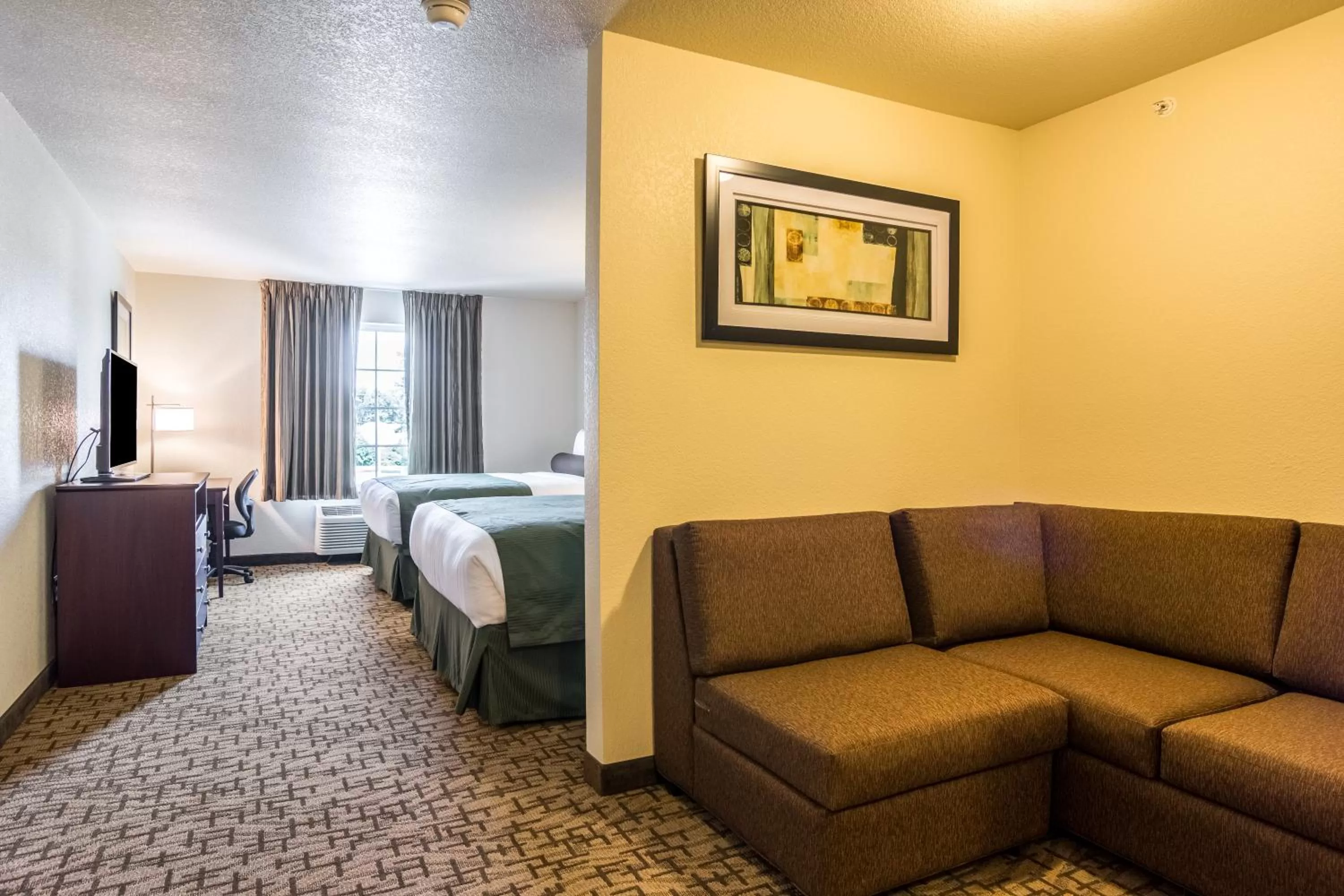 Bed in Cobblestone Hotel & Suites - Torrington