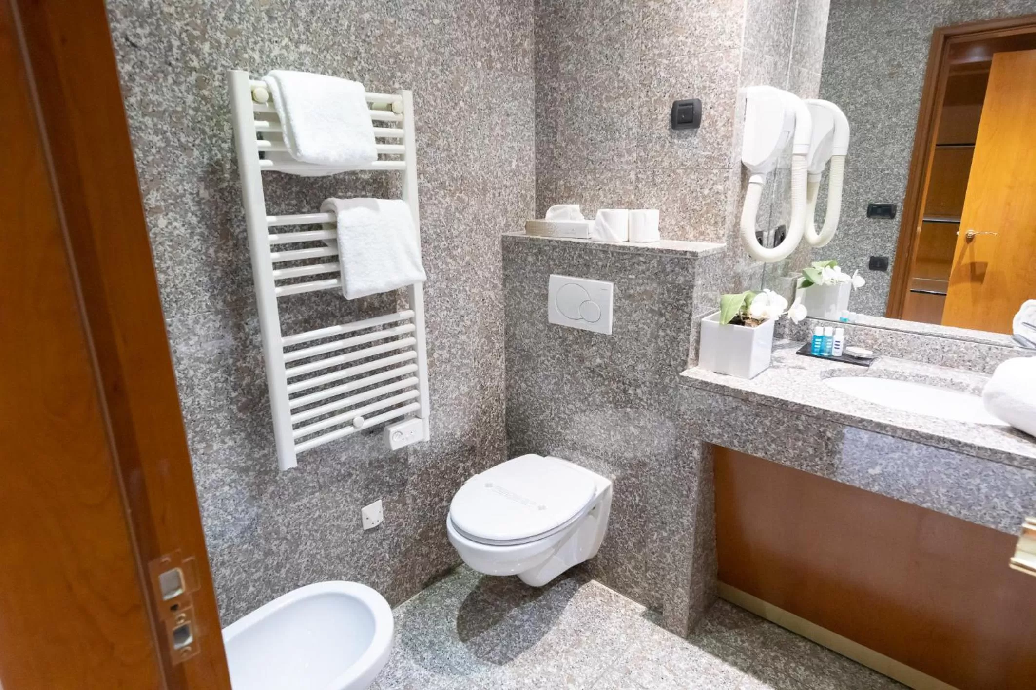 Shower in Goldstar Apartments & Suites