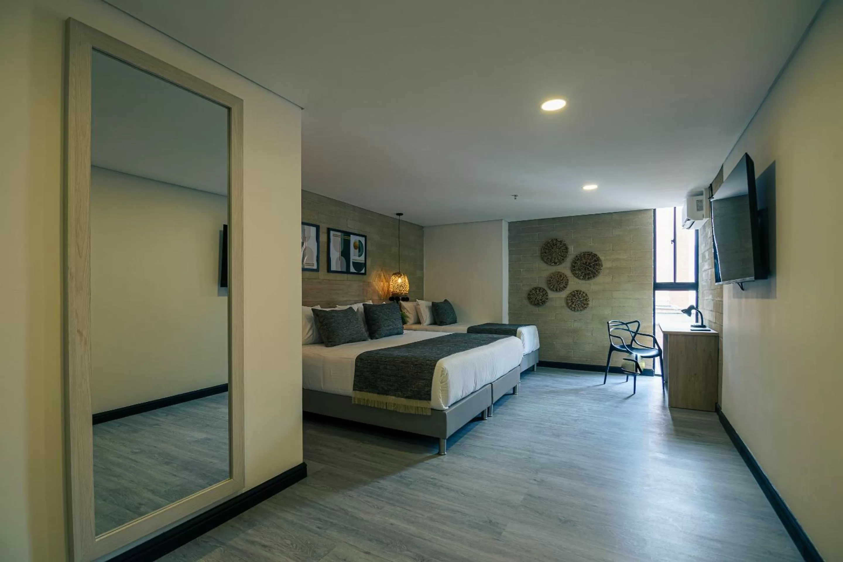 Photo of the whole room, Bed in First Class Hotel