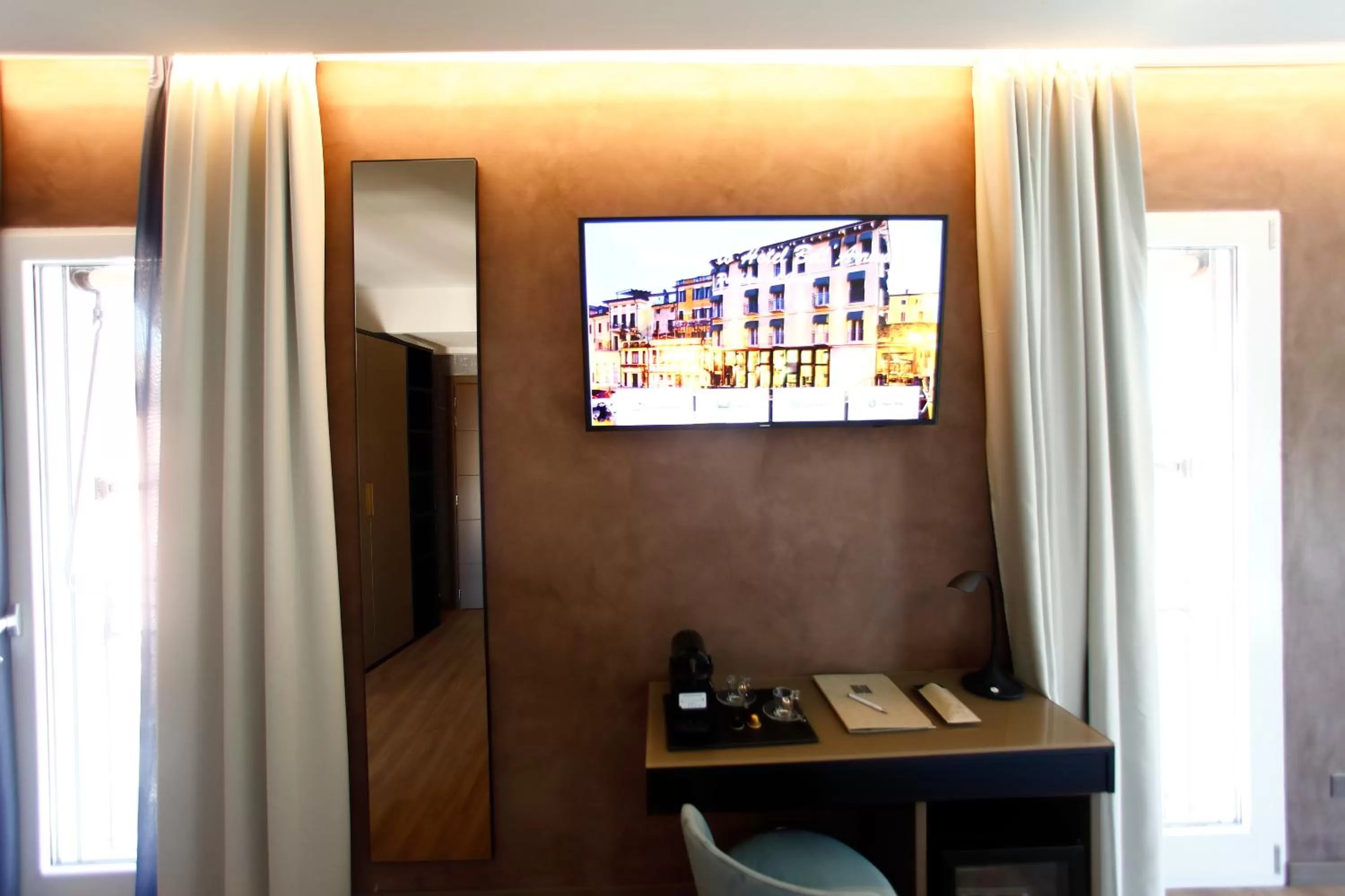 TV and multimedia in Hotel Bell'arrivo by Dori