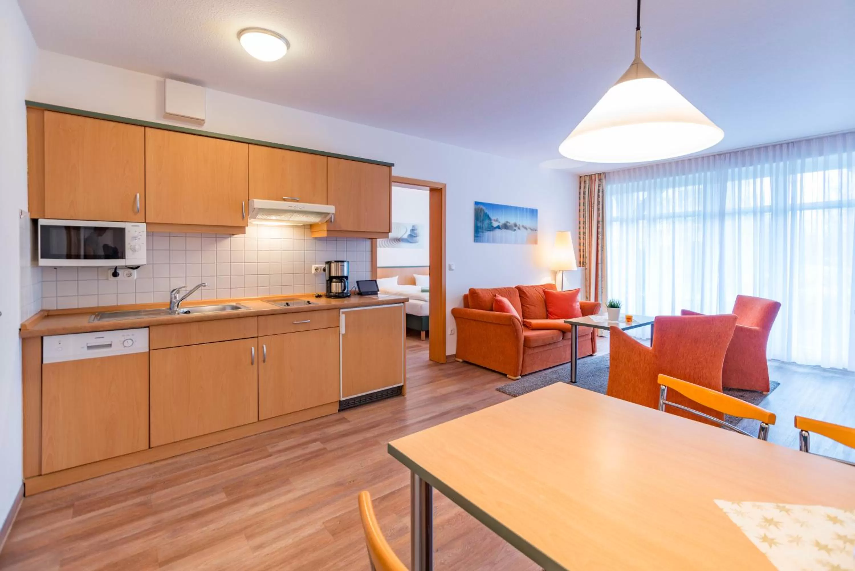 Photo of the whole room, Kitchen/Kitchenette in Am Weststrand Apartmenthaus Waldeck