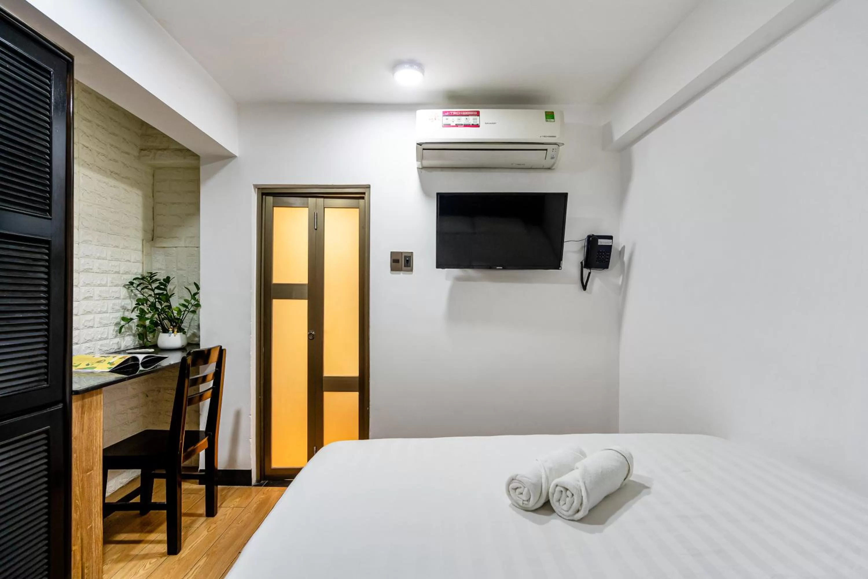 Bed in Lotus Laverne Hotel