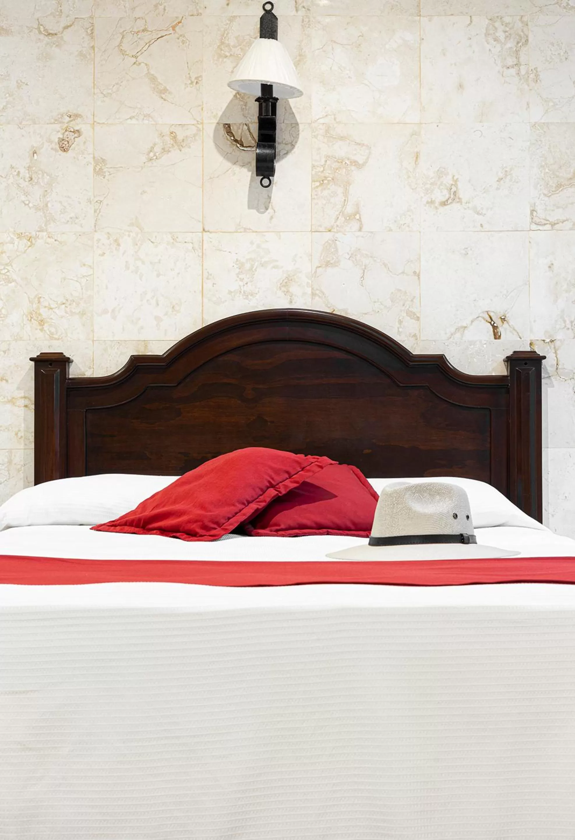 Bed in La Aurora Hotel Colonial