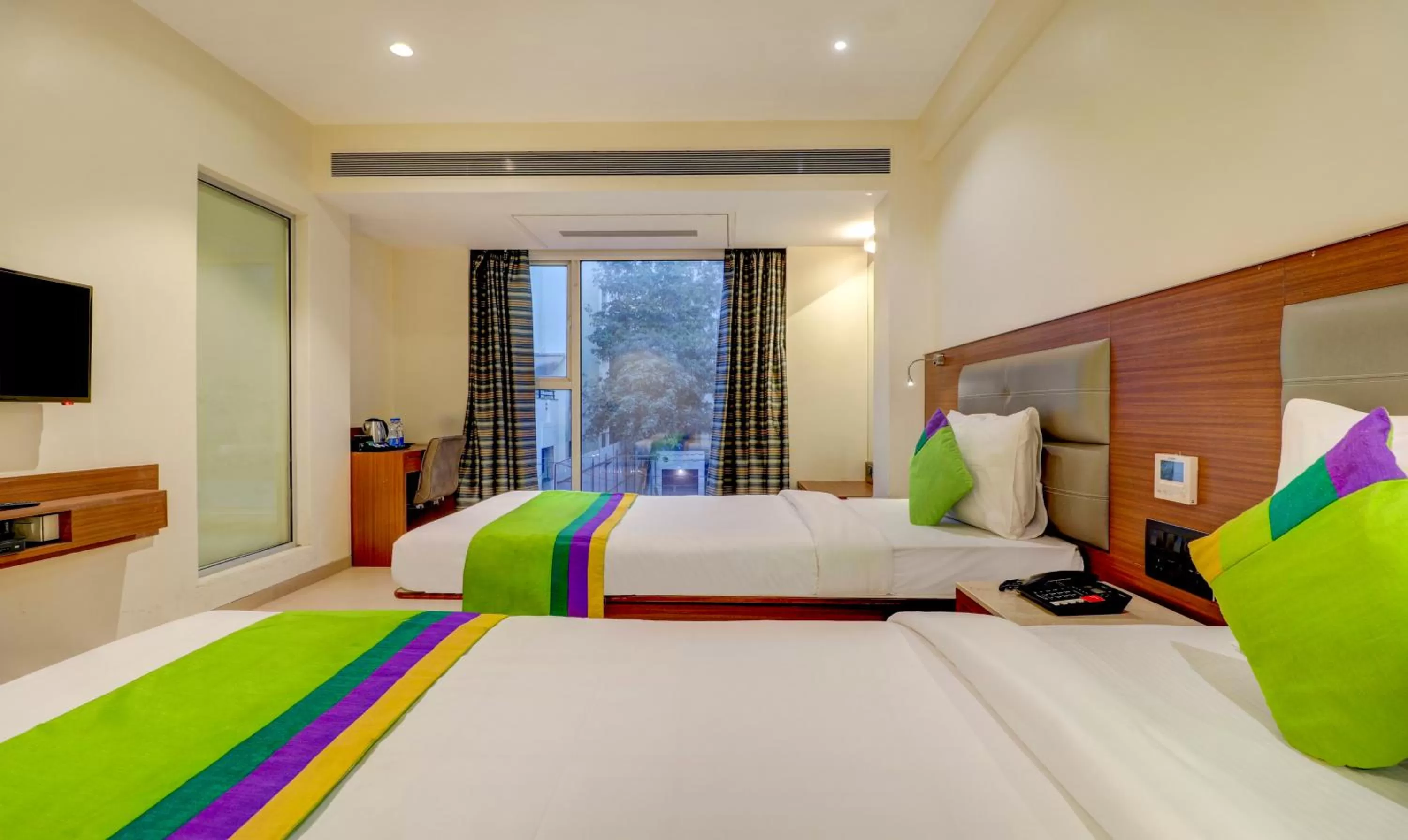 Bed in Treebo Ranjeet Shivaji Nagar