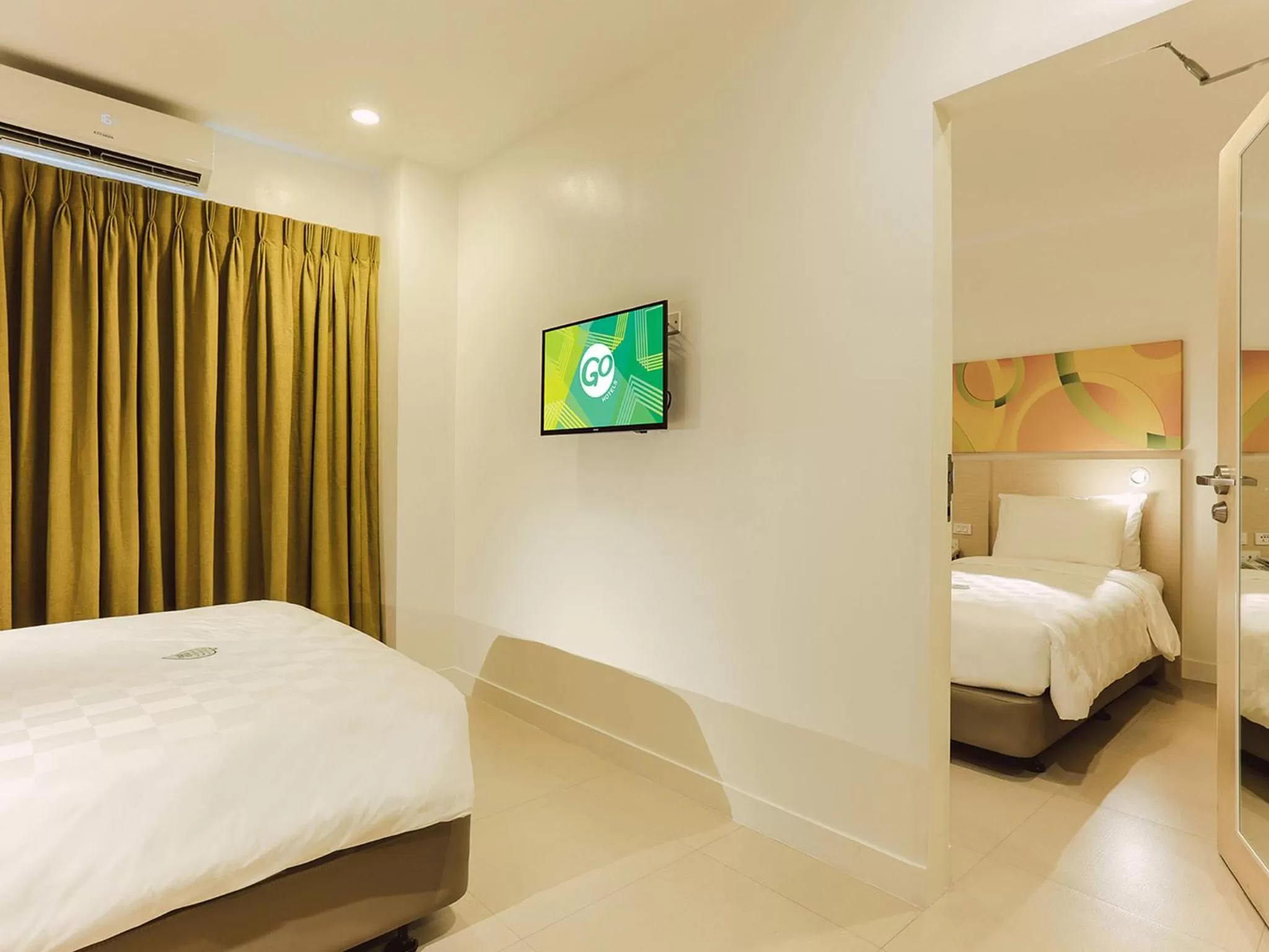 Bed in Go Hotels Timog