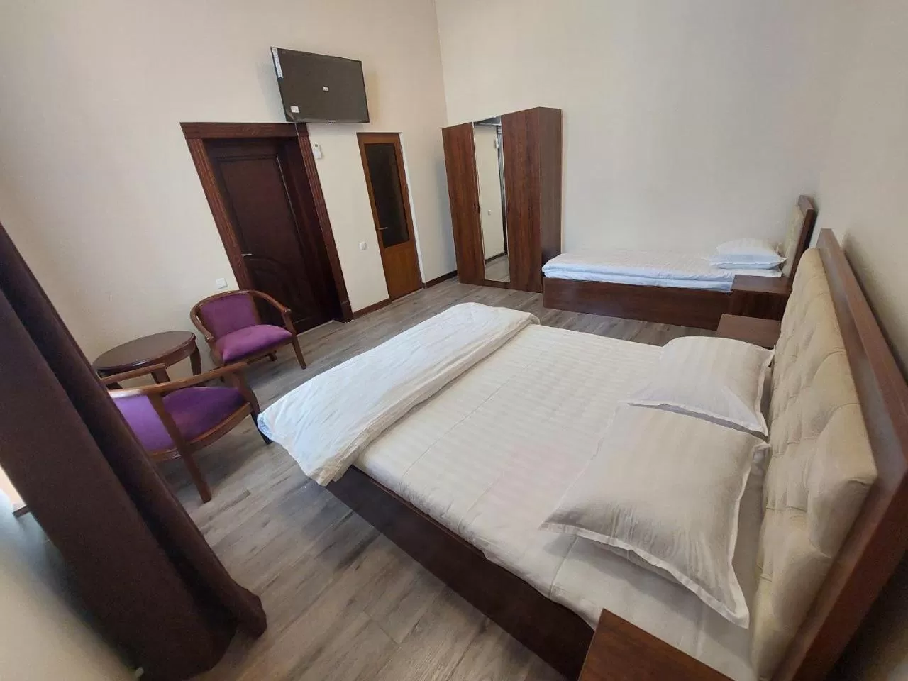 Photo of the whole room, Bed in Samarabonu Hotel
