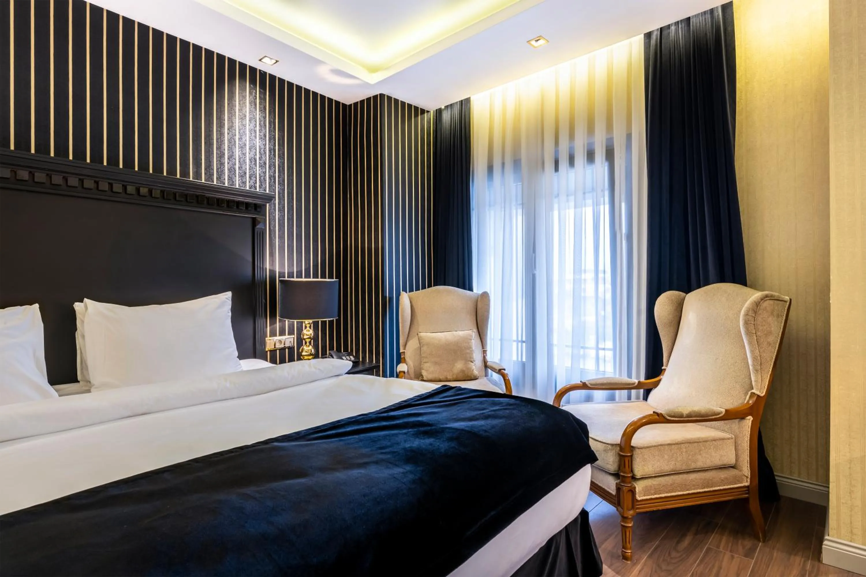 Bed in Golden Gate Hotel Topkapı